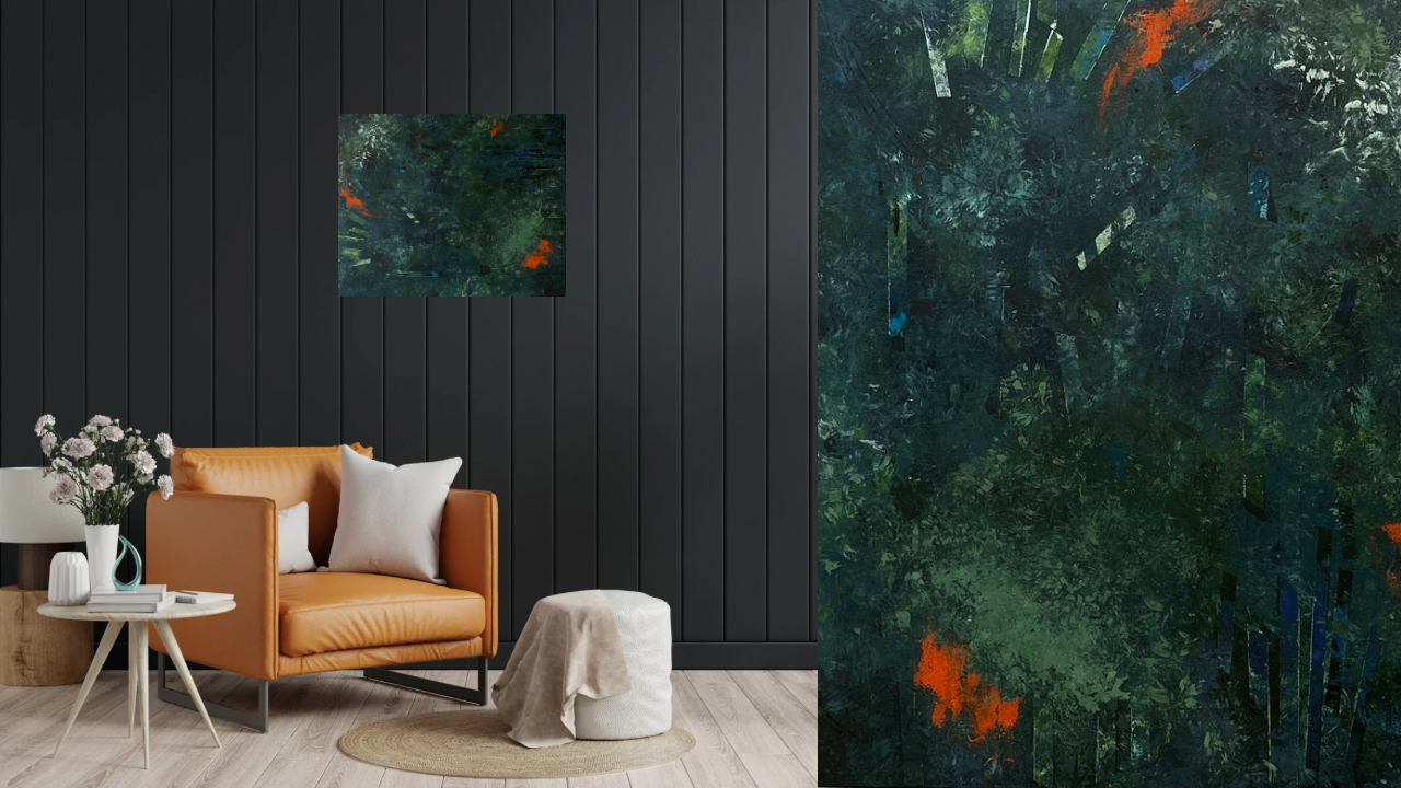 Living room with black paneled wall, abstract artwork, orange leather armchair, white pillows, side table with a vase of pink flowers, books, and a small ottoman covered with a white blanket.