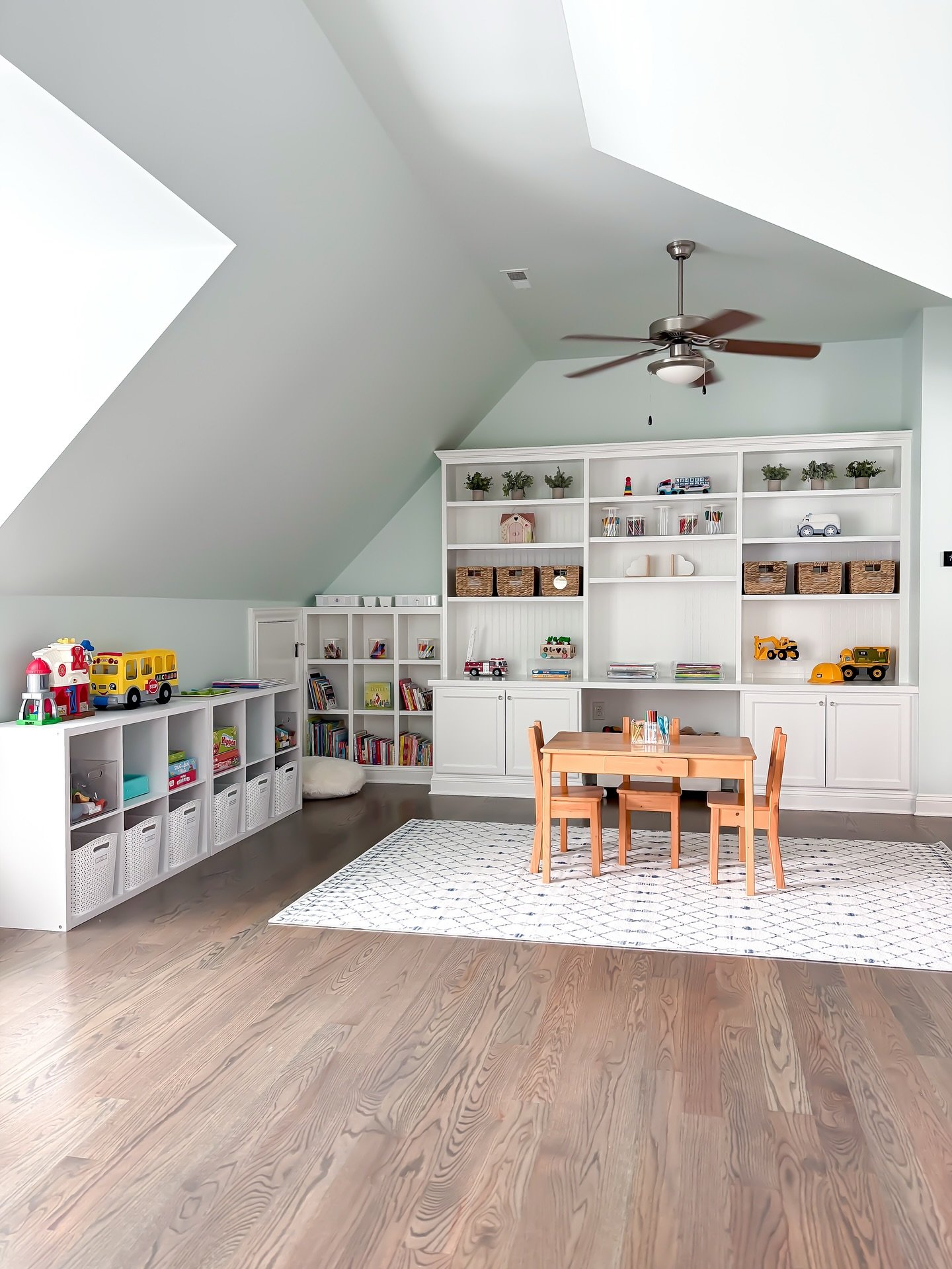 Summertime magic starts with a little order! This playroom is divided into intentional zones that inspire creativity, encourage independence, and make cleanup a breeze.

From art to pretend play, every area has a purpose - because when everything has