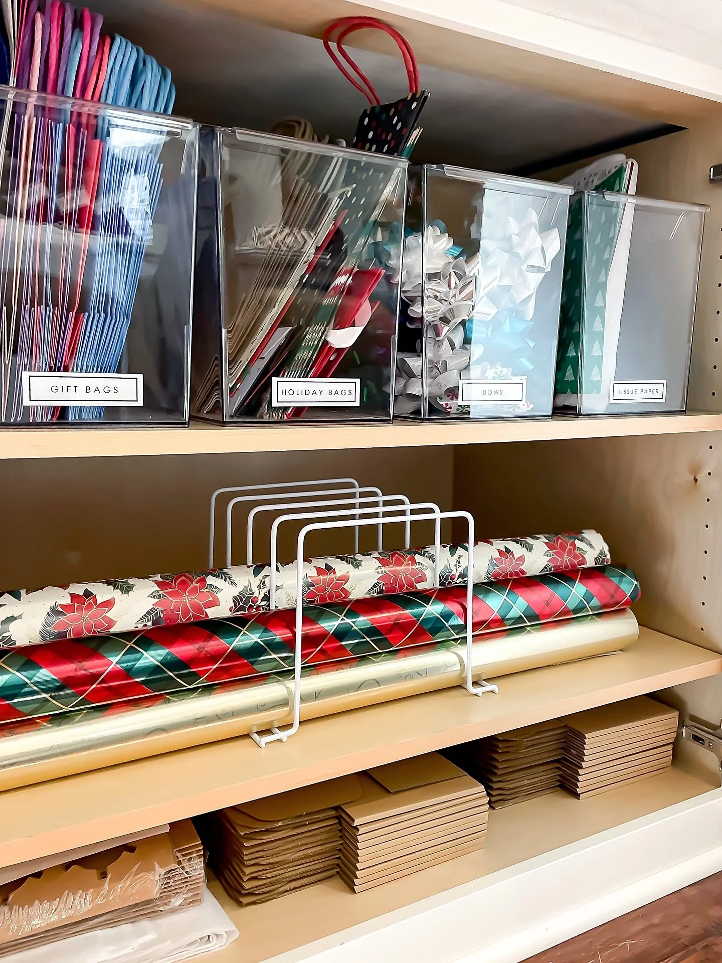 Putting a bow on holiday prep 🎀

A tucked-away solution for keeping gift wrap beautifully out of sight.

✨Like, share, or save this idea if you need to wrap gifts at the kitchen island&mdash;not the bedroom floor anymore.