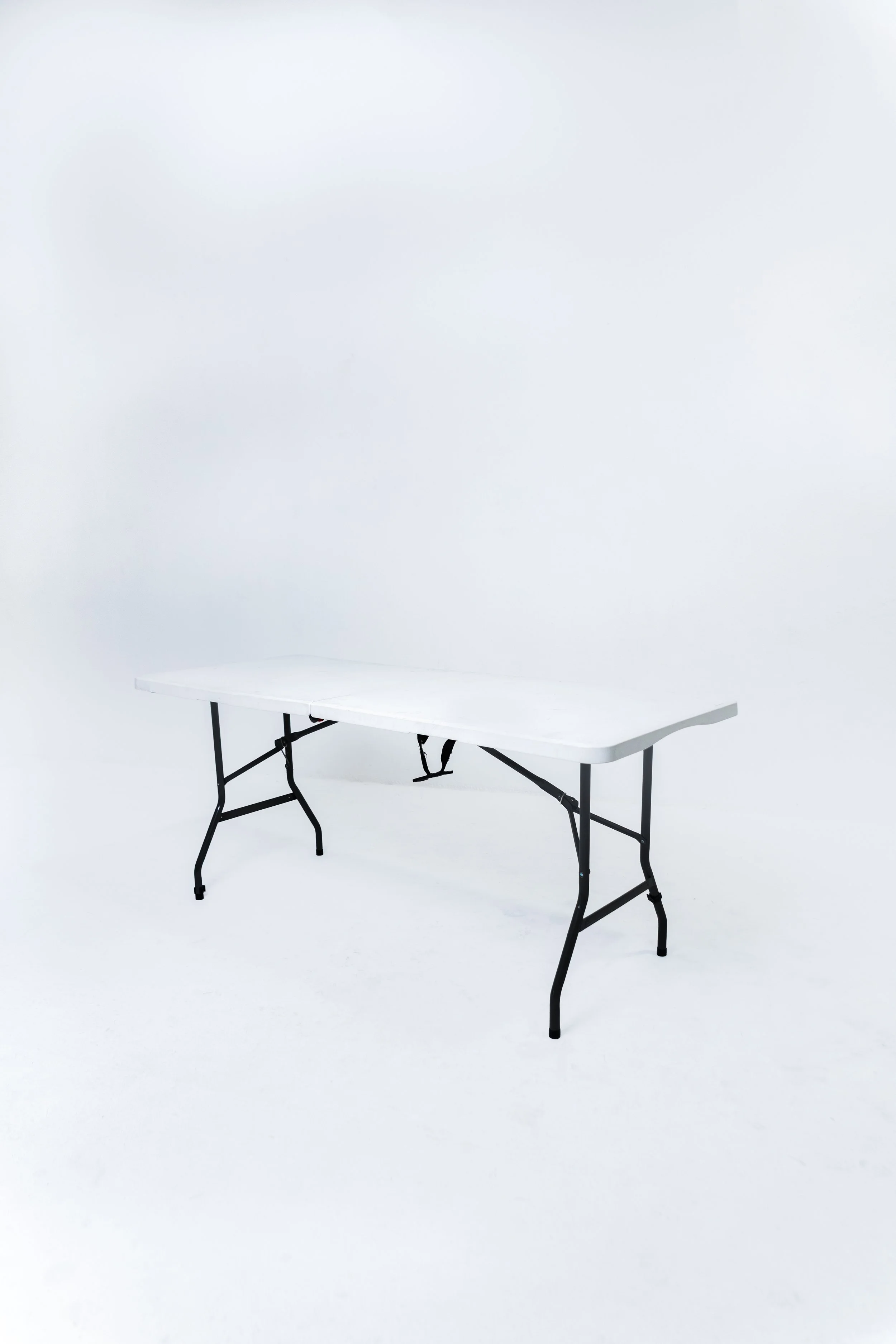 White Folding Table - $12