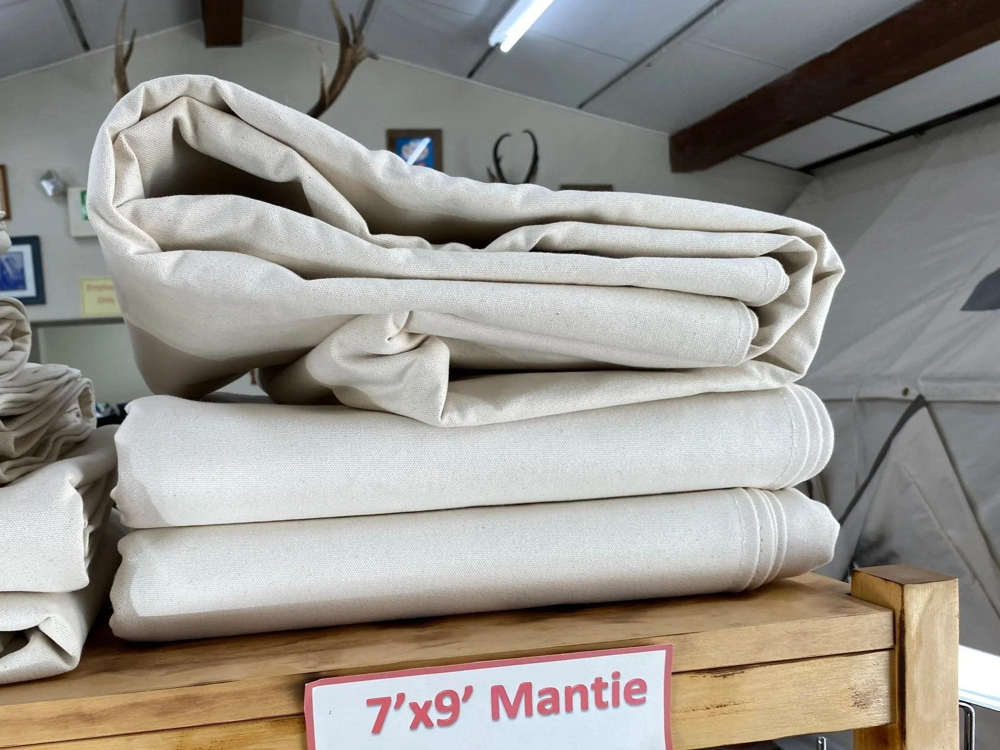7'X9' MANTIE
Made out of 15 oz canvas and double hemmed around outside edges.