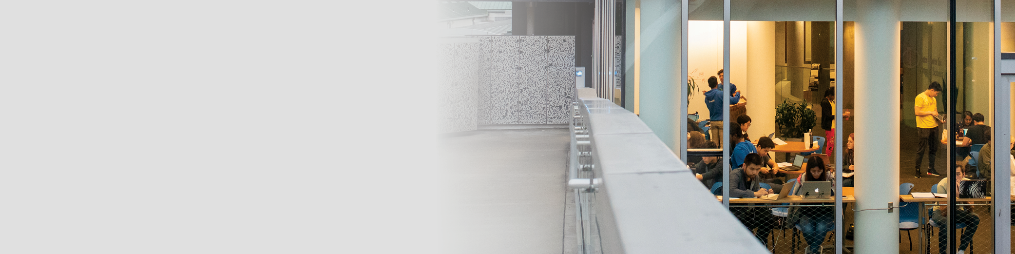 Looking inside of Gates at students working