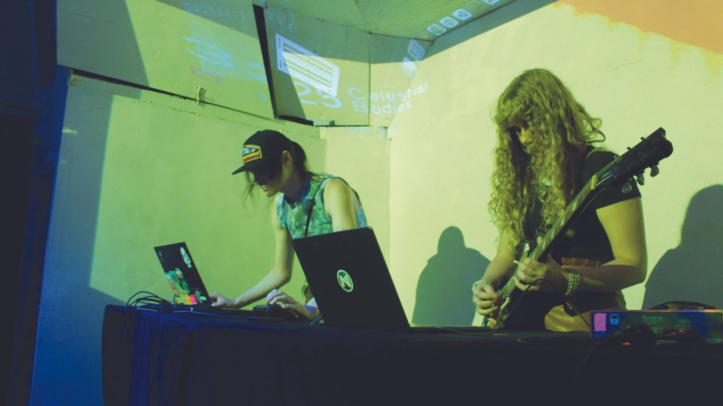 Sara Adkins performs live, combining playing instruments with coding.
