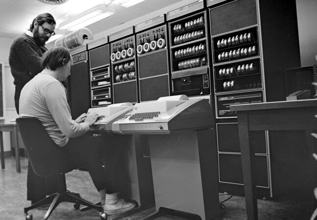 Brian Kernighan (left), who invented “Hello, World!” with the two creators of C programming: Ken Thompson (right) and Dennis Ritchie. Kernighan is originally from Toronto, Canada, and is known to coin the expression “What You See Is All You Get” (WYSIAYG) as it relates to the sensitivities of programming language.