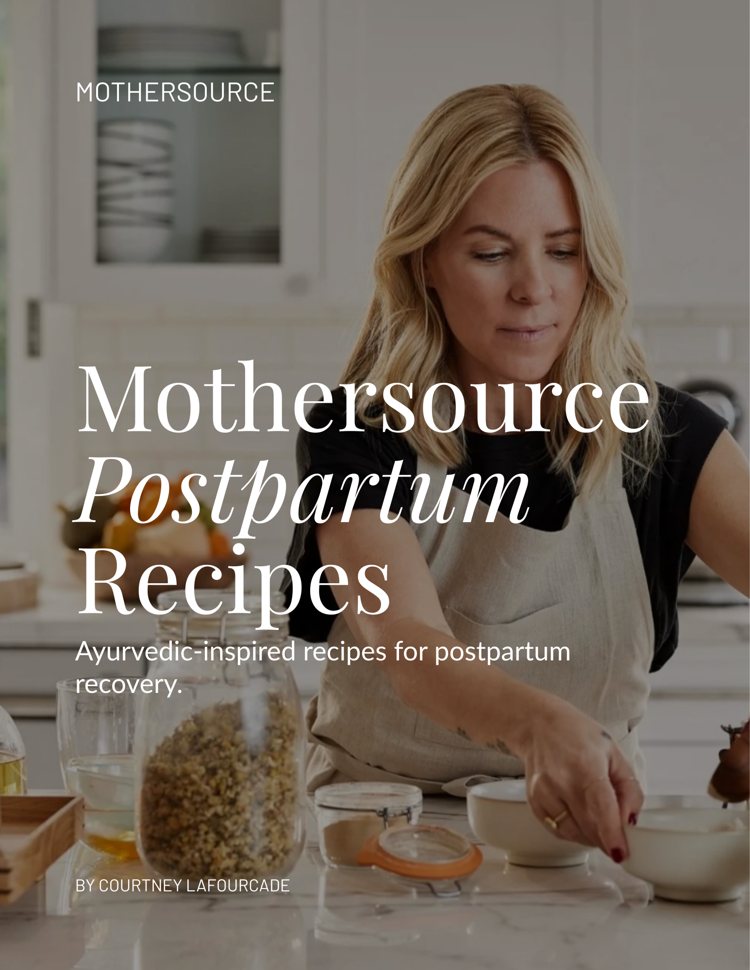 A woman in a black shirt and tan apron preparing food in a modern kitchen with white cabinets. There are glass jars, bowls, and ingredients on the counter. The overlay text reads 'Mothersource Postpartum Recipes' and 'Ayurvedic-inspired recipes for postpartum recovery', by Courtney LaFourcade.