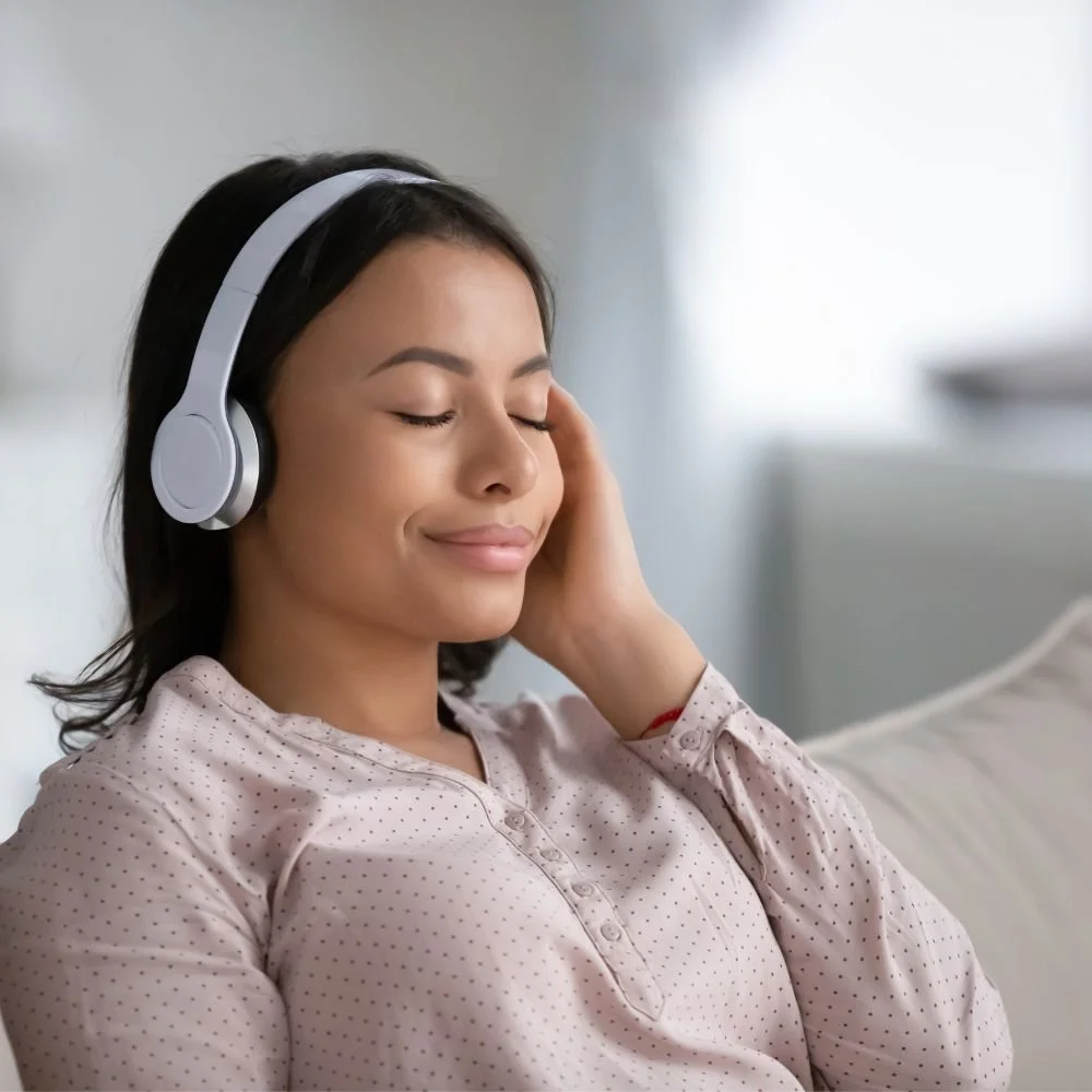 woman listening on headphones