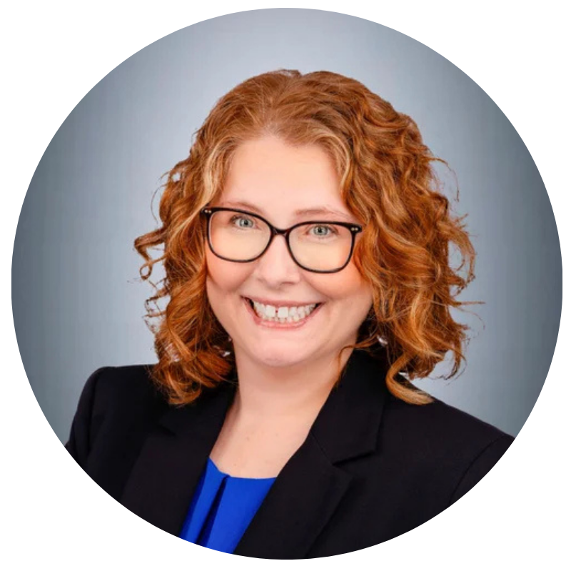 Jennie Feight headshot with grey gradient background