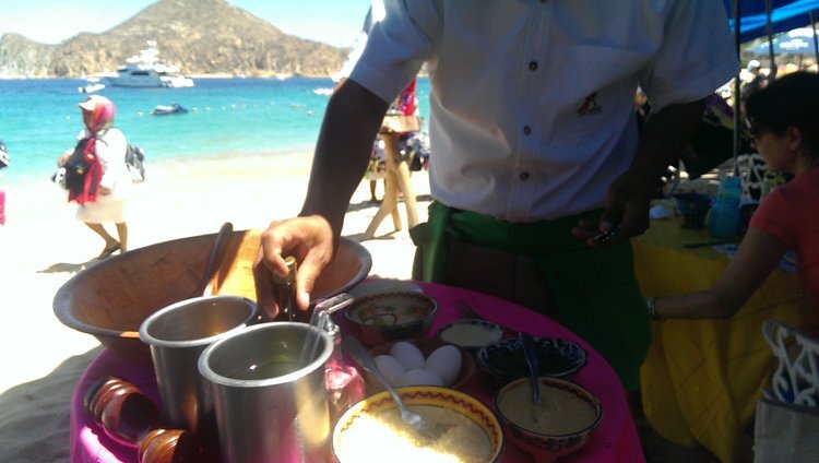 Caesar Salads made table side at The Office in Cabo San Lucas, Mexico