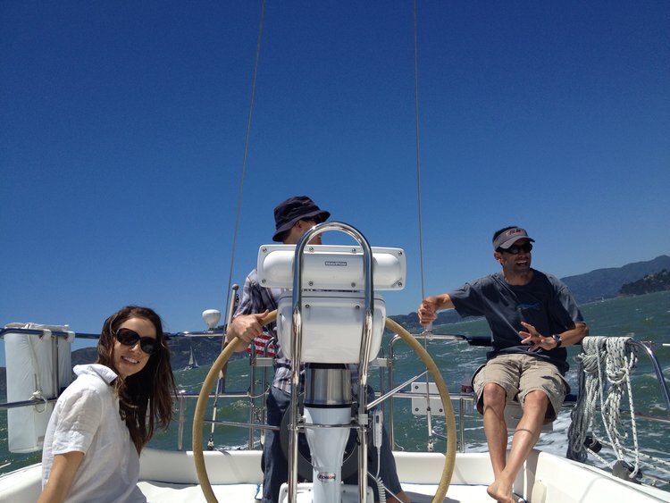 Sailing pilot friends on their boat in SF Bay, Ca