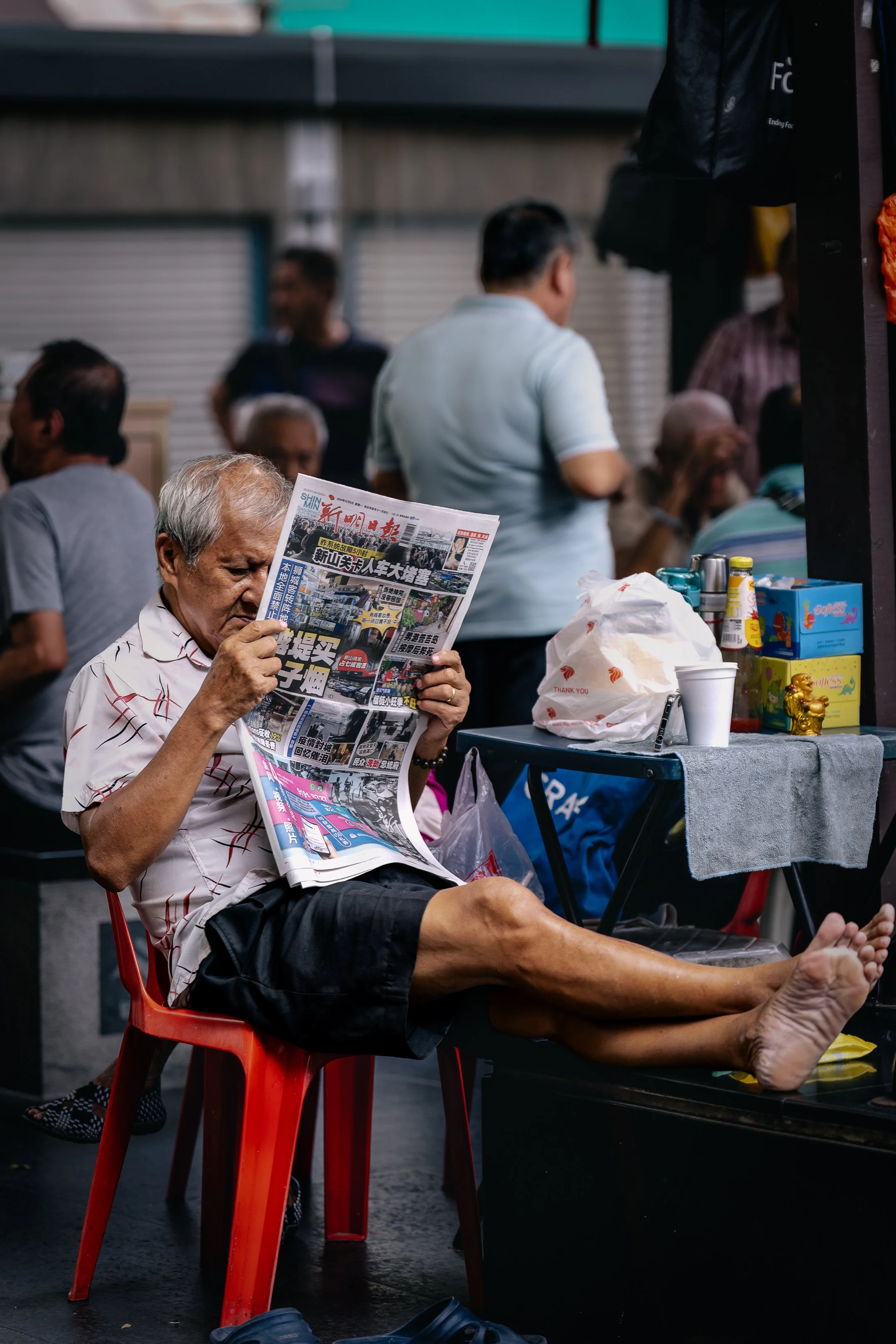 Reading the daily news.