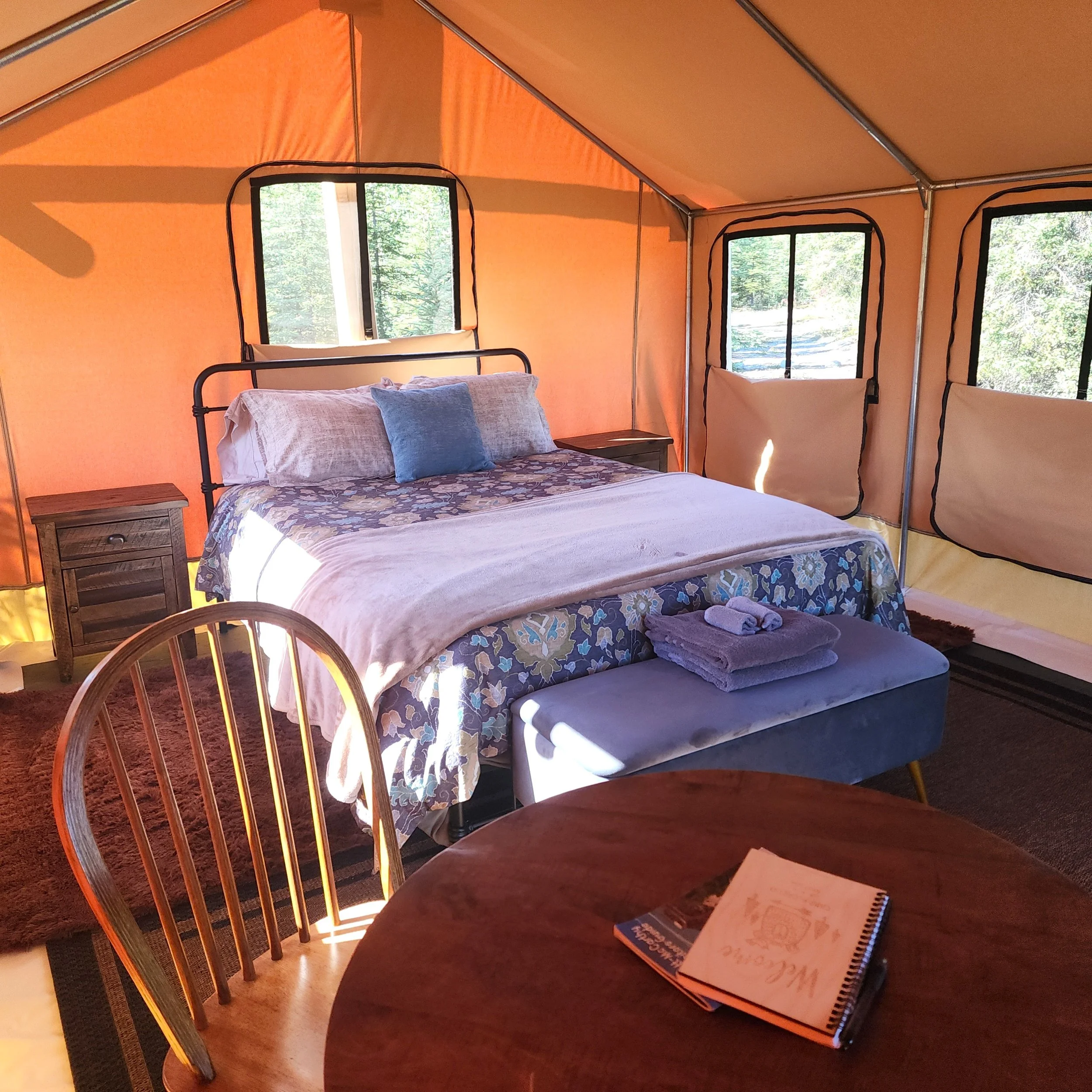 Cozy interior of canvas tent at Camp McCarthy.