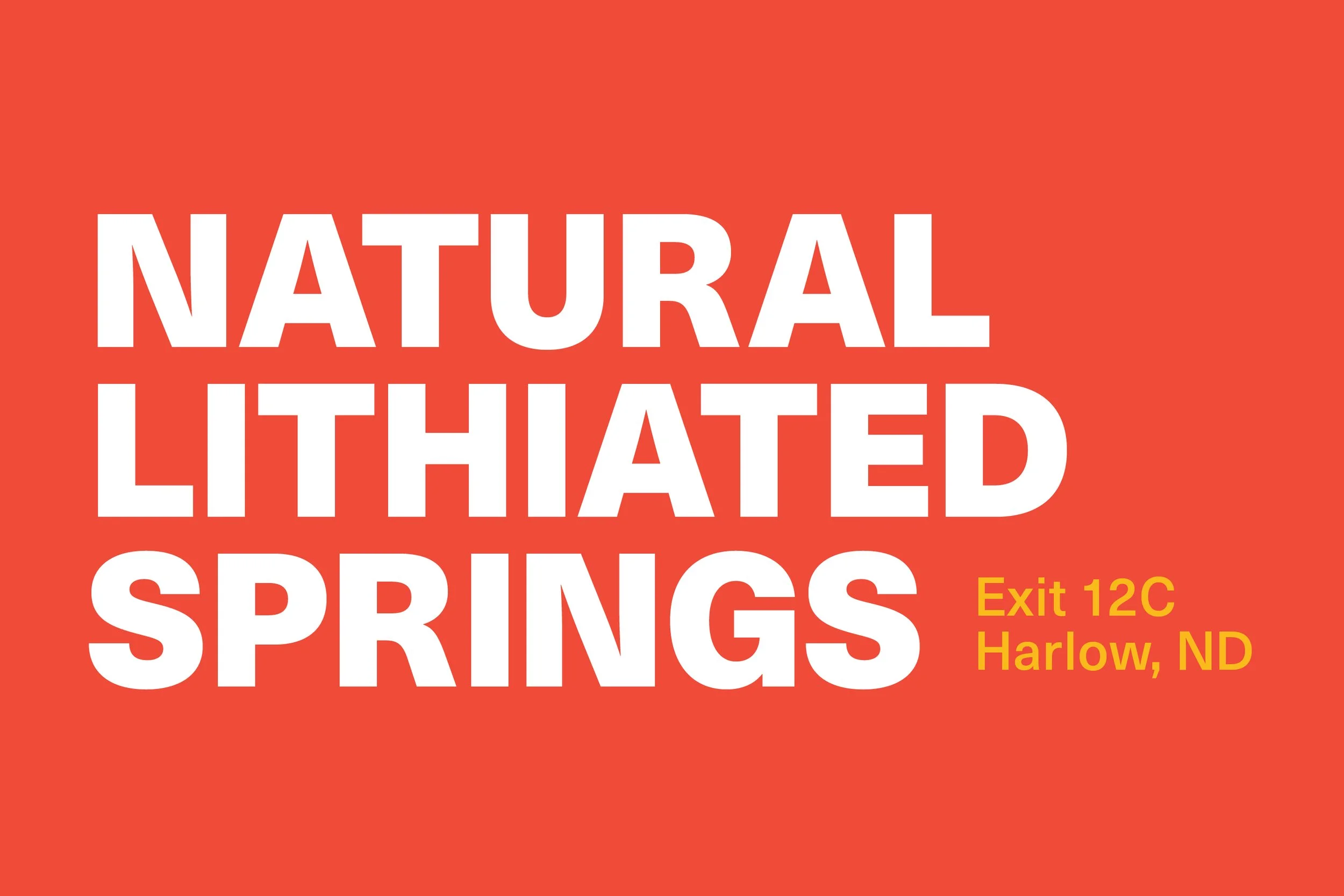 Red sign with white text reading 'Natural Lithated Springs' and yellow text 'Exit 12C Harlow, ND'.