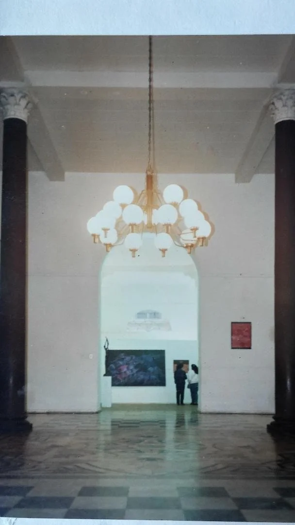 
"Hope, " painting by Professor -Artist Luis  Garay, and their artworks of his students in the Annual Art Exhibition Hall of The Lima Art Museum. 