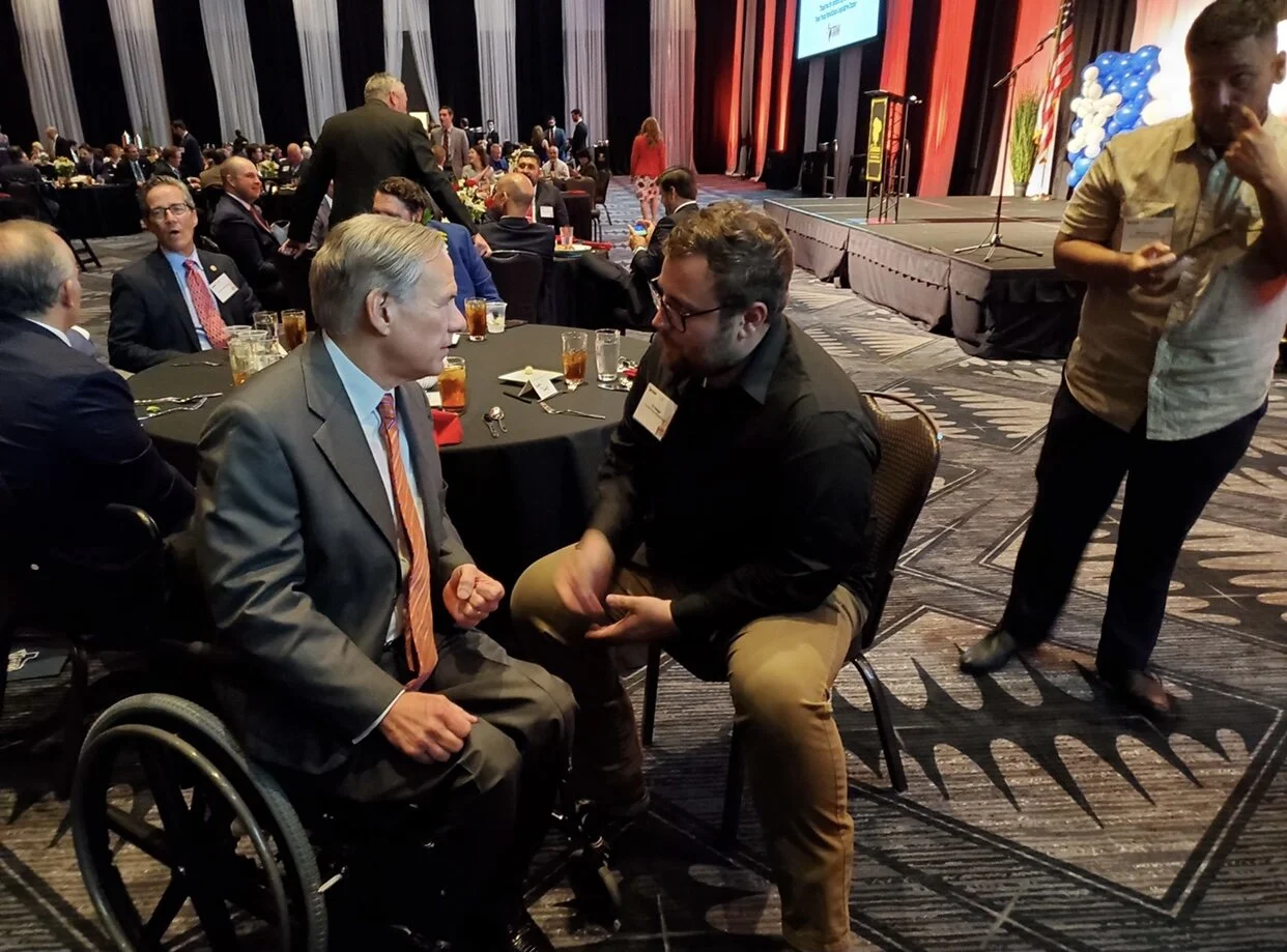 Governor Greg Abbott and DJ Seeger talking during the Young Republicans Legislative Dinner