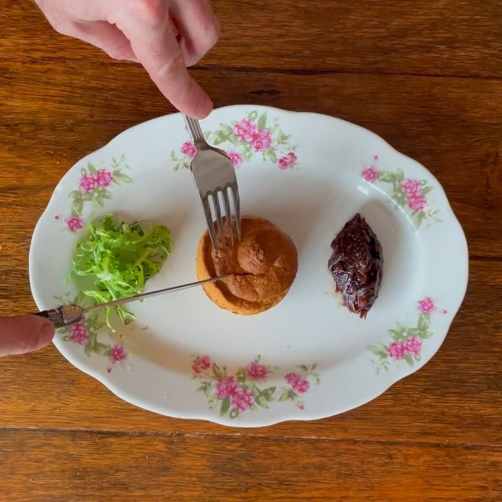 &ldquo;Coulant de Chevre&rdquo;

A take on the Michel Bras classic traditionally made with chocolate. Here, made with a savoury Parmesan scone/biscuit/cake, baked fluffy and crisp with a warm  centre of goats cheese b&eacute;chamel.
Served with caram