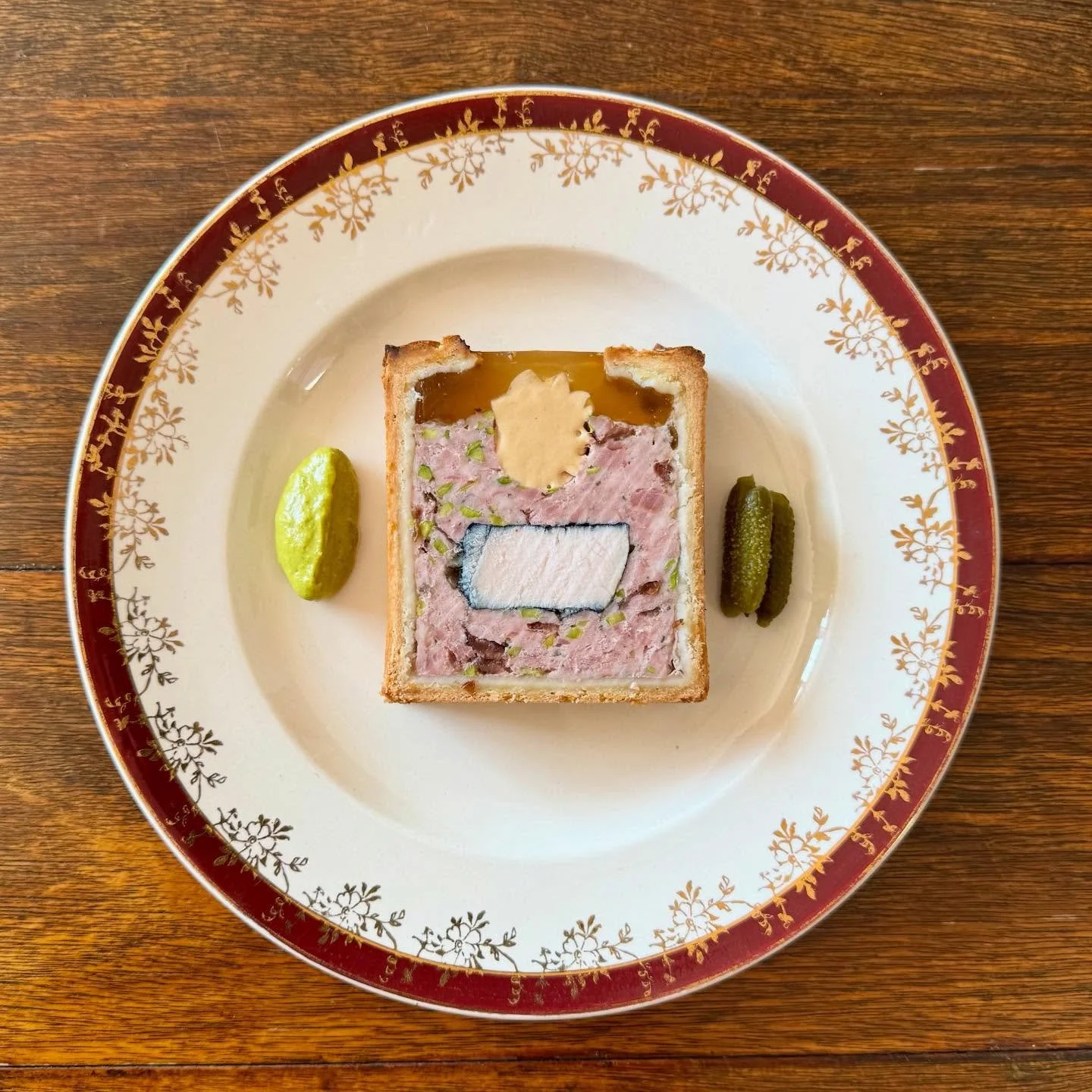 &ldquo;P&acirc;t&eacute; en Cro&ucirc;te No&euml;l&rdquo; 

A seasonal favourite makes its triumphant return for the month of December at Porcine.
All Butter Pastry, Pork farce with Ham, Pistachio, Cranberries, Nutmeg &amp; Brandy. 
Housing a centrep