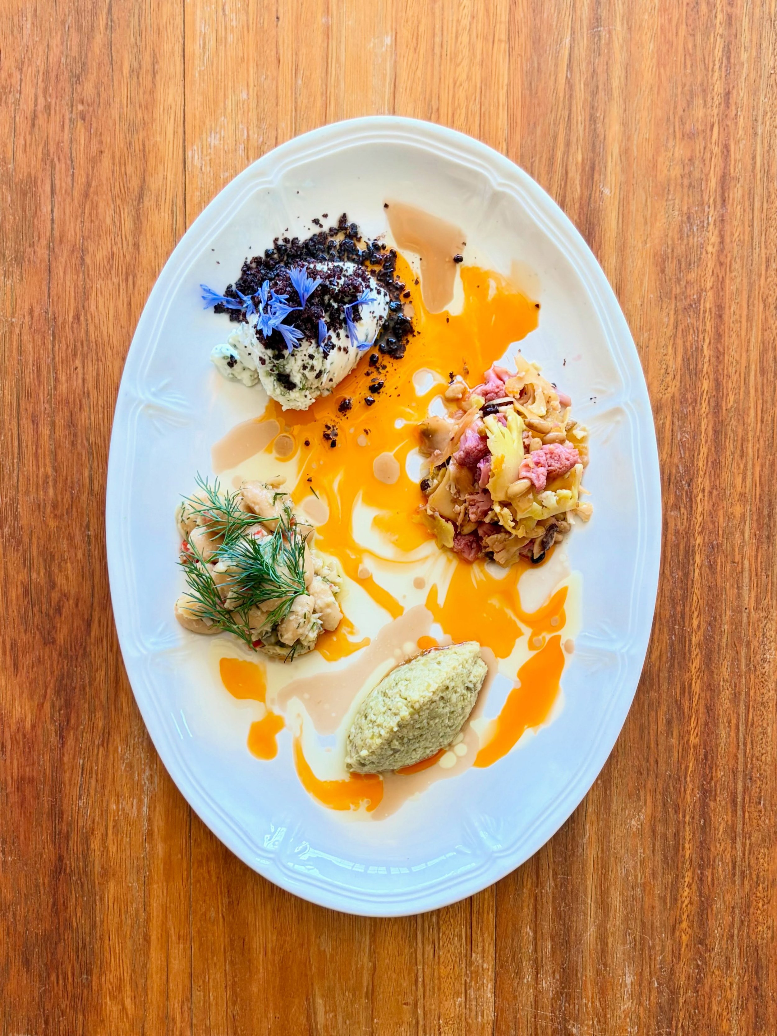 &ldquo;Plat Proven&ccedil;al&rdquo;

An evolving array of dips, spreads &amp; pickles inspired by the south of France. 
-Boursin Cheese &amp; Dried Olives
-Salad of Cauliflower, Pinenuts, Currants &amp; Cumin
-Green Olive Tapenade 
-White Beans, Chil