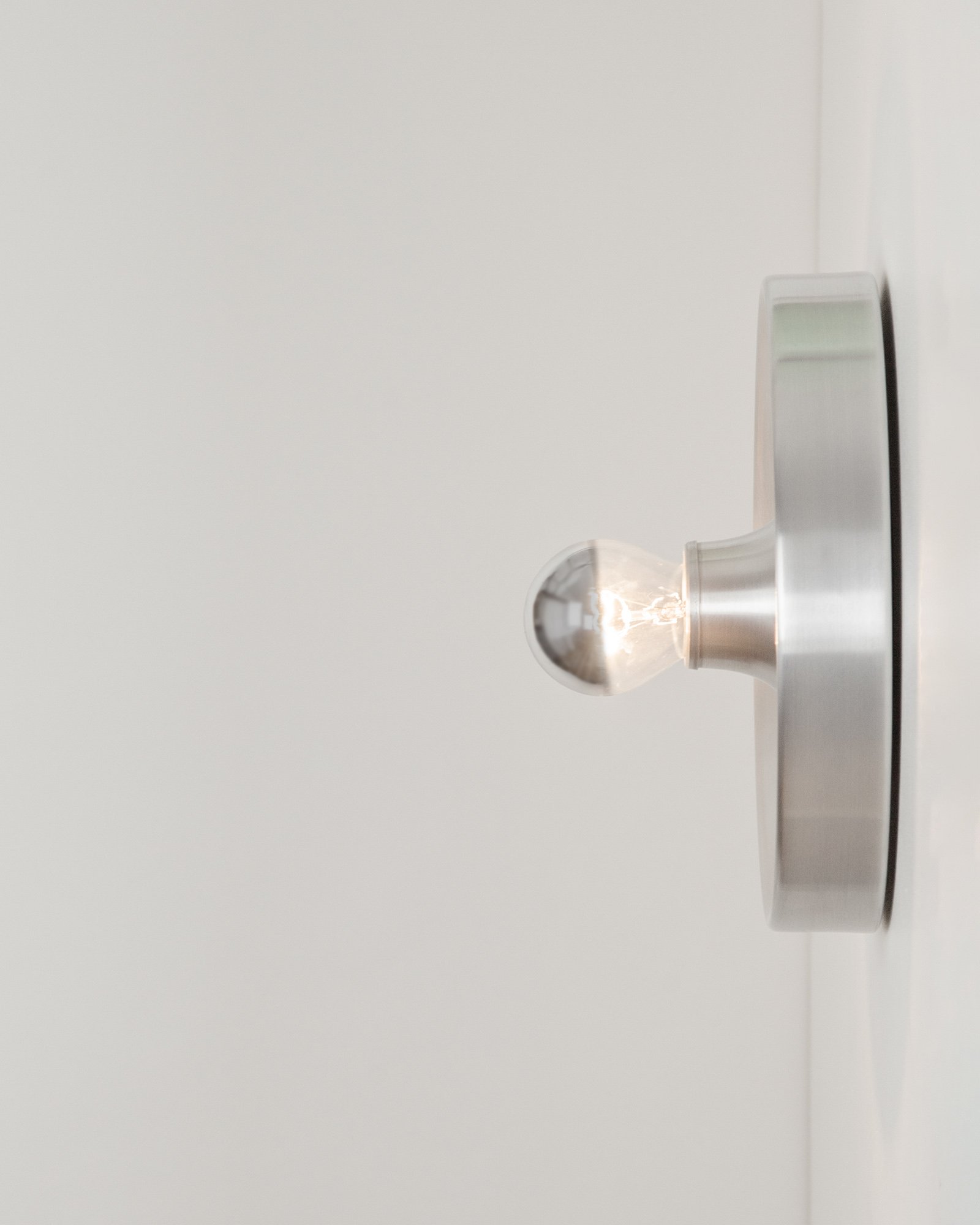 Brushed Aluminium Sconce by Staff, Germany, 1960s