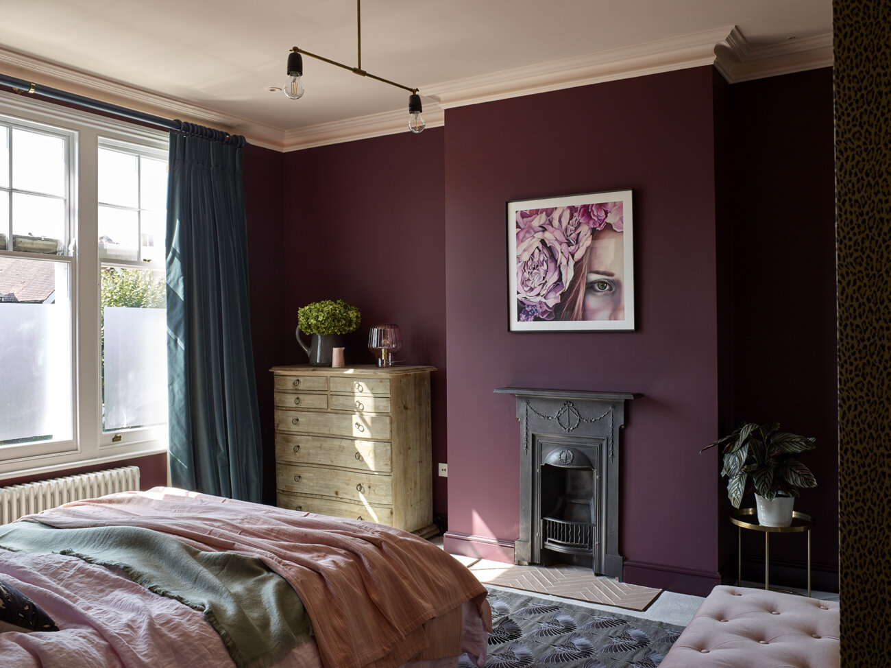 vic-32-burgundy-bedroom-black-fireplace.jpg