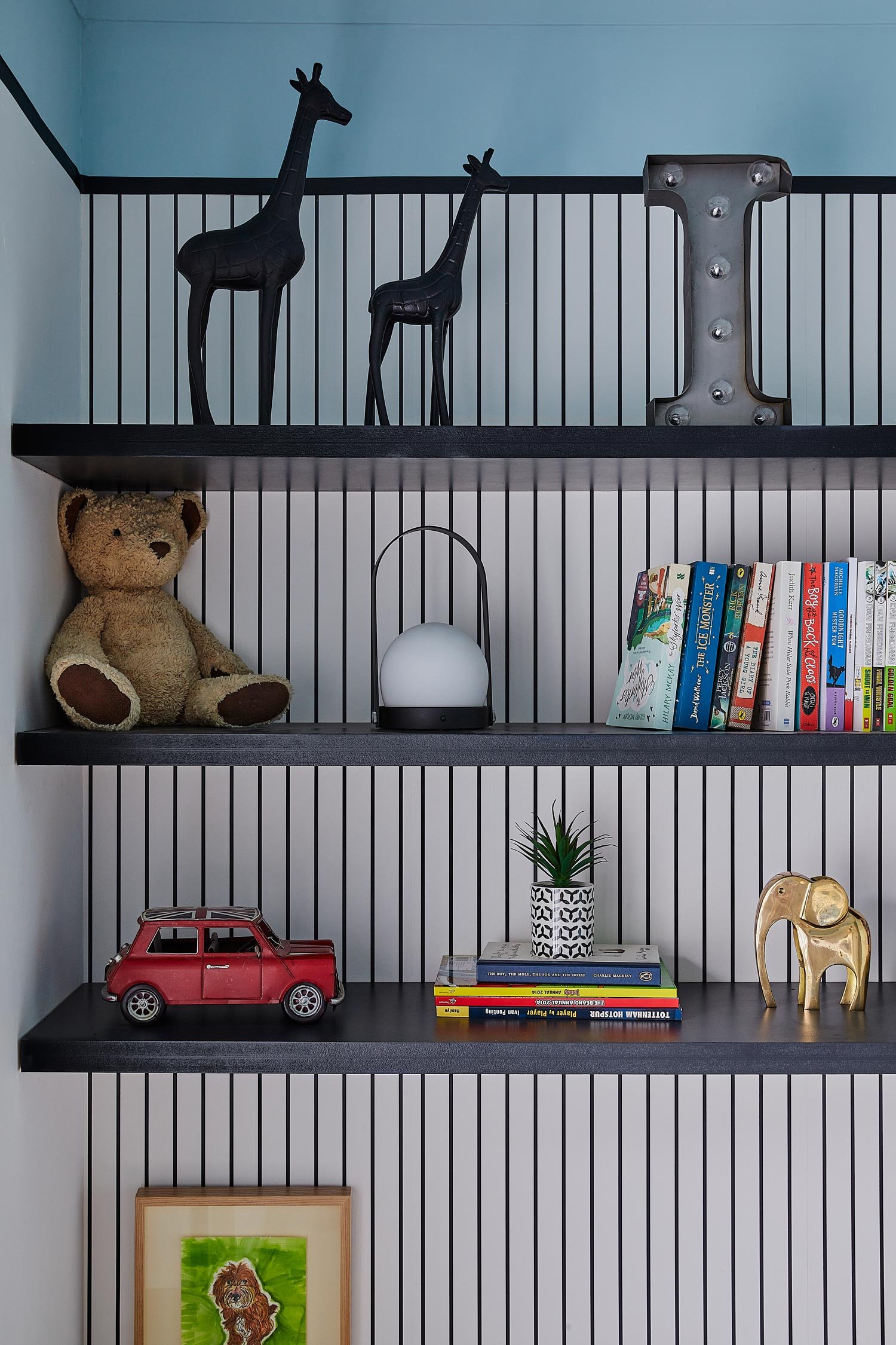 floating-shelving-infront-of-striped-wallpaper.jpg