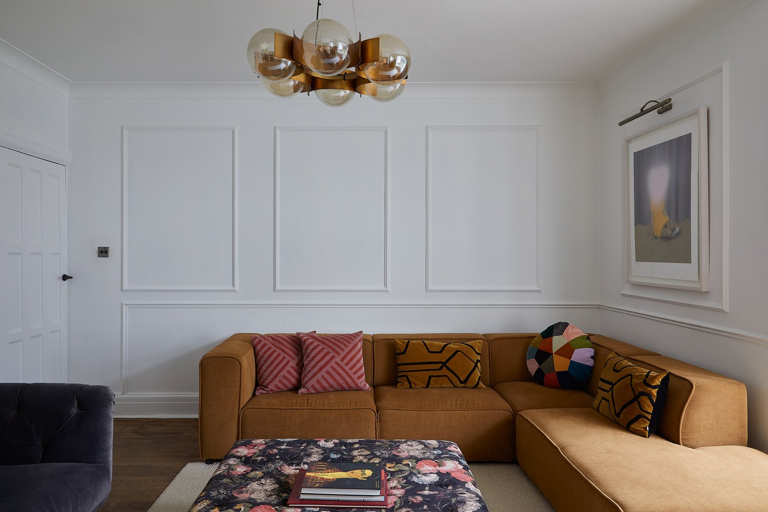 honey-corner-sofa-under-metallic-ceiling-light.jpg