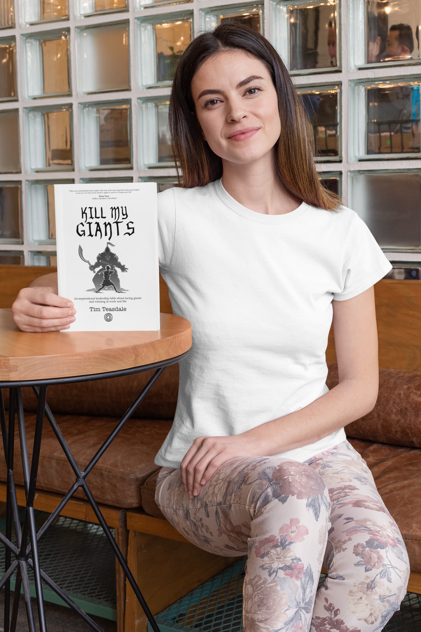 t-shirt-mockup-of-a-woman-promoting-a-book-28485.png