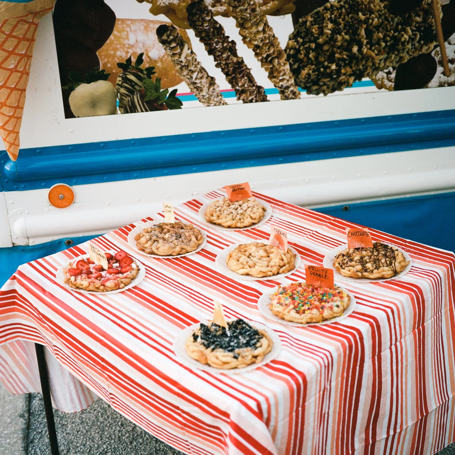 photograph of funnel cakes at carnival