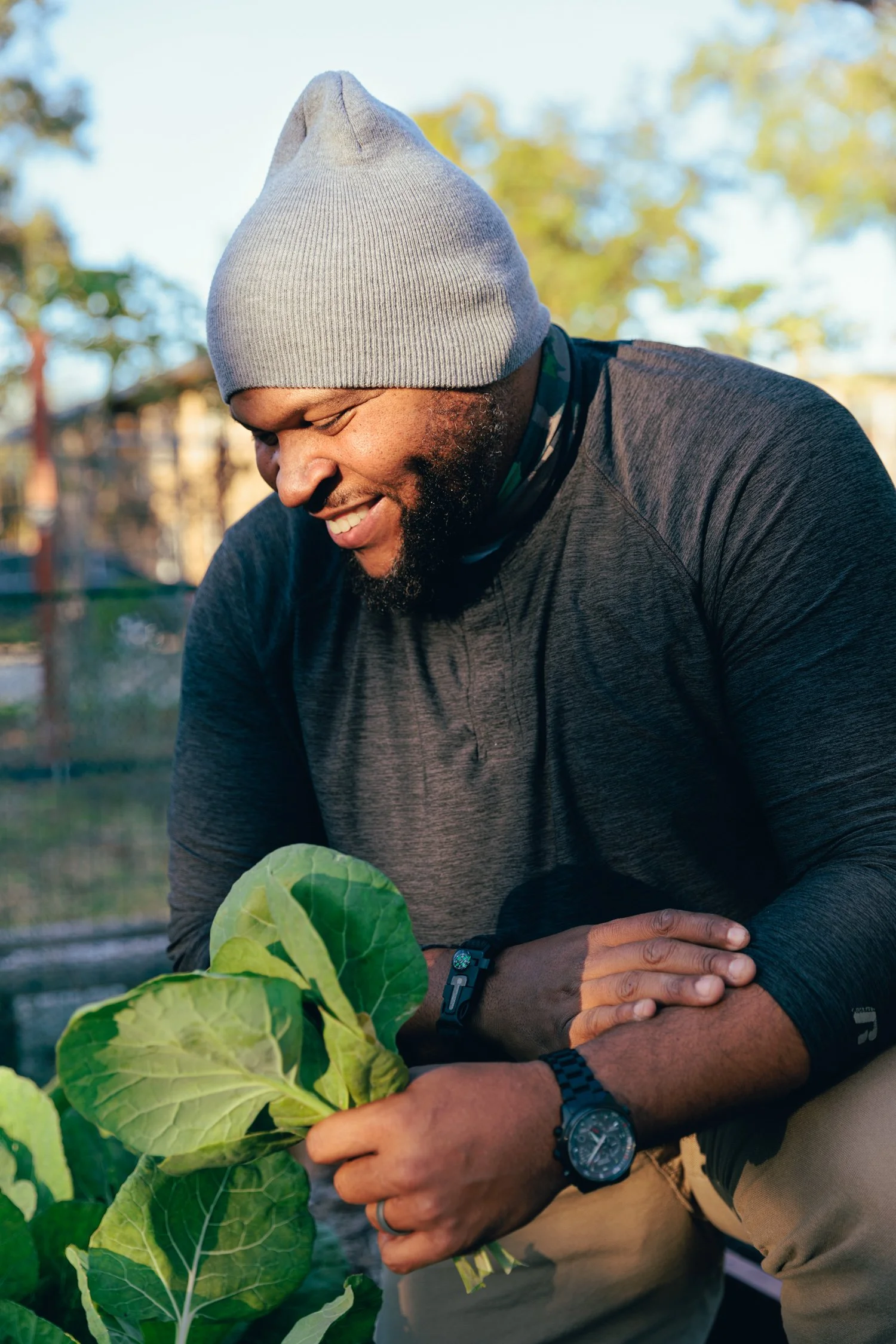 photograph of ray warthen picking greens