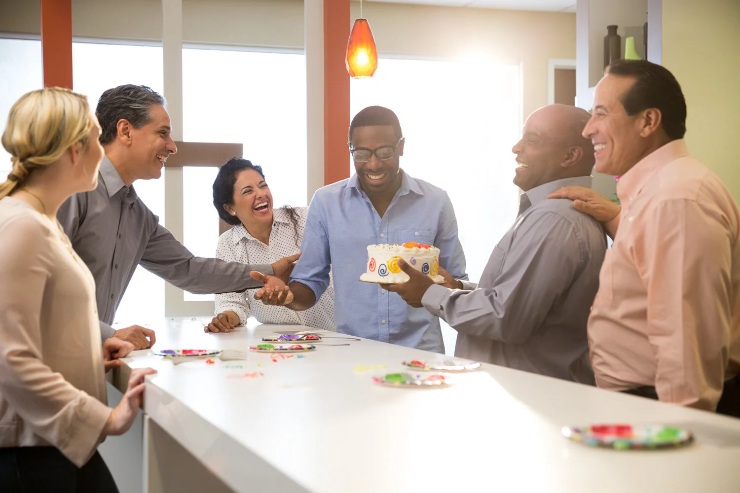 Photograph of company birthday party