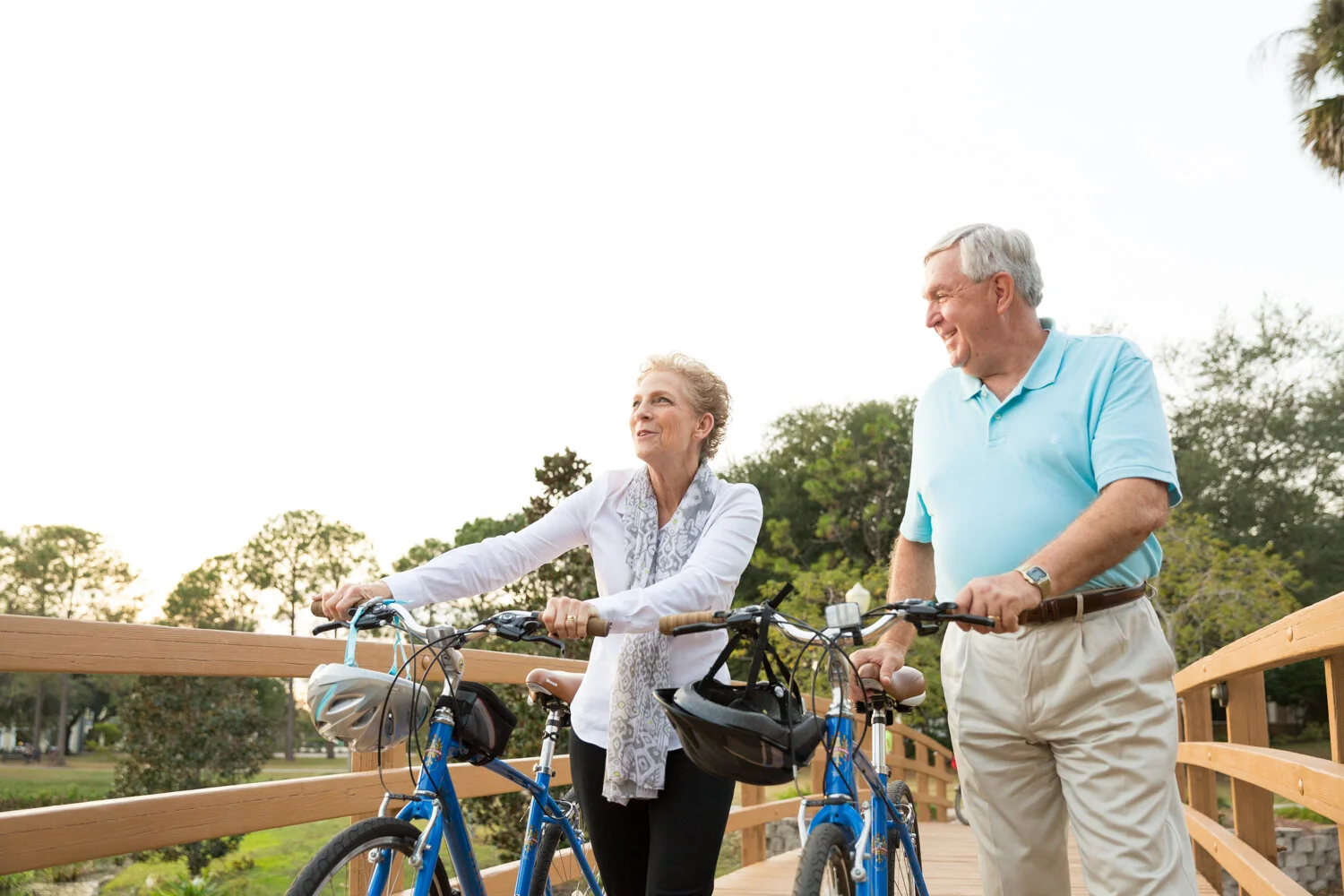 Photograph of elderly walking bikes
