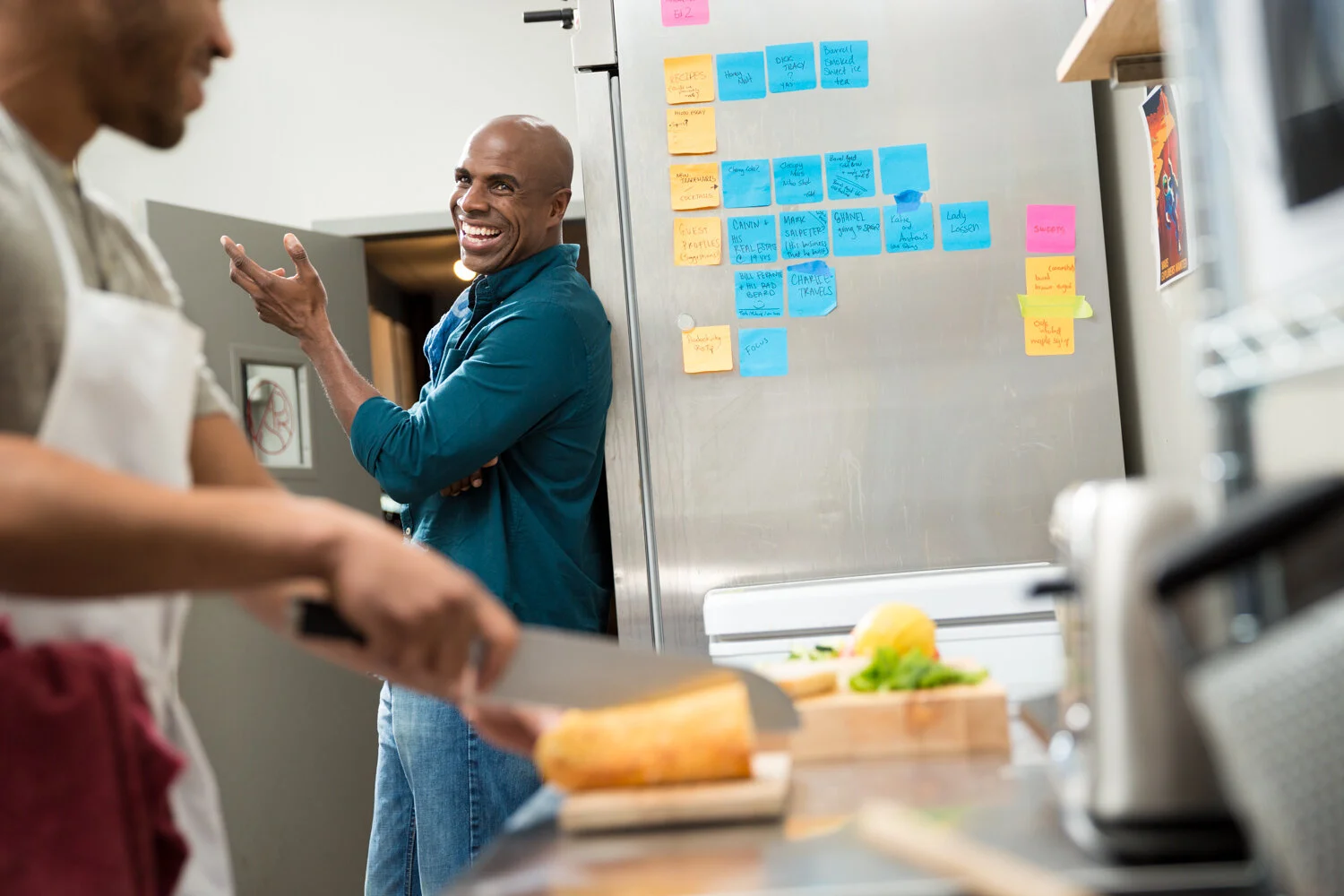 Photograph of boss in back of kitchen