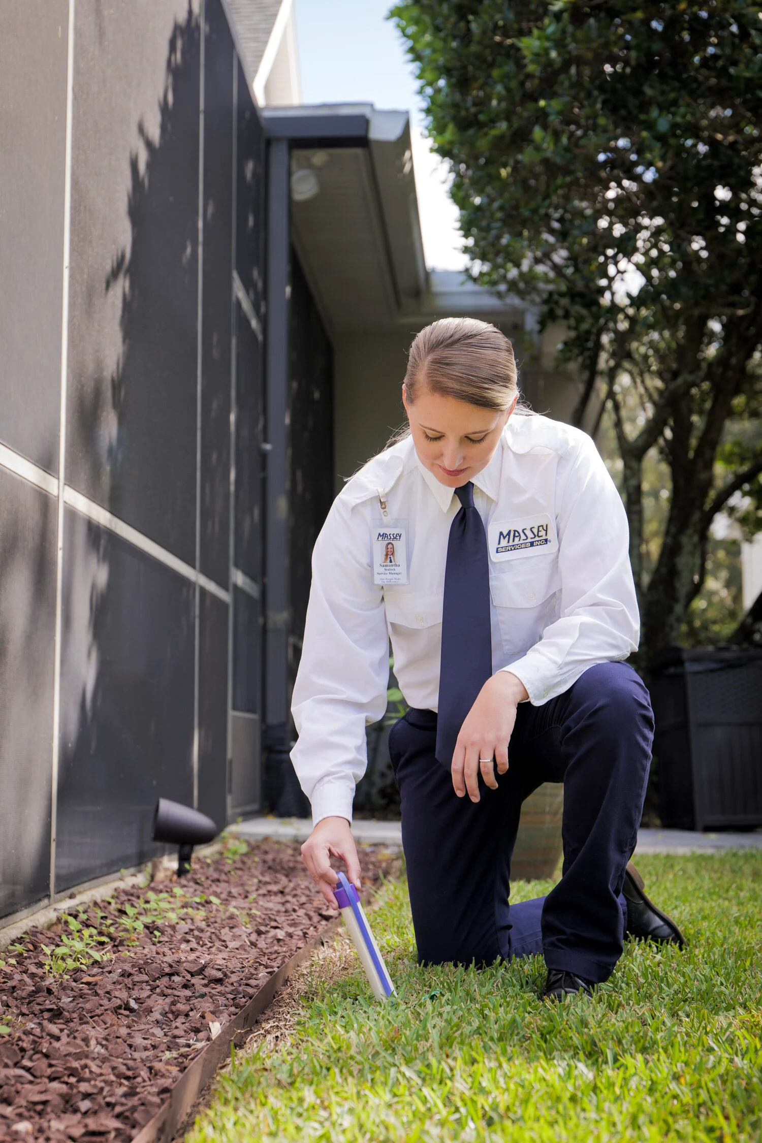 Massey Services inspecting yard near pool