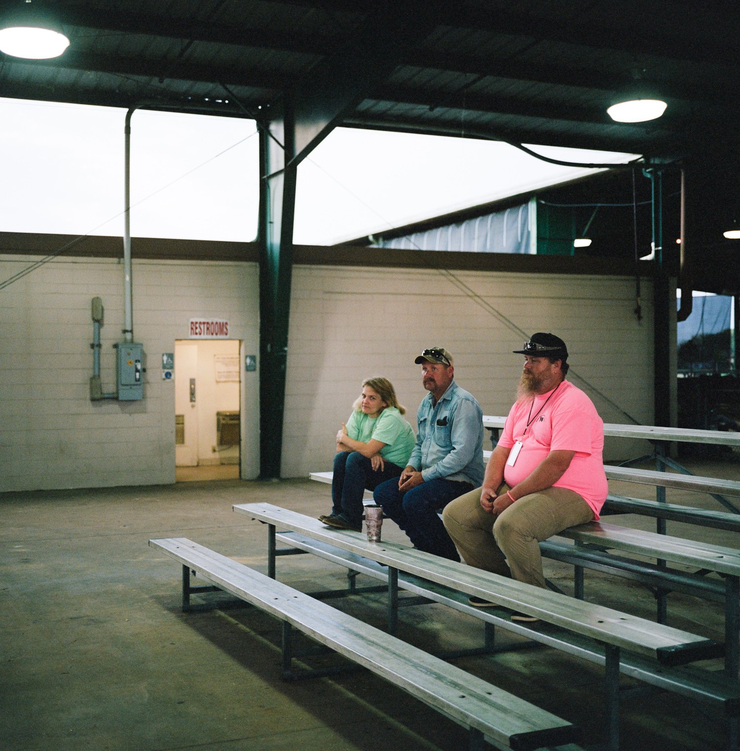 photograph of group under awning at cow show