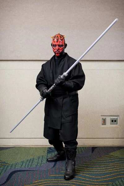 photograph of man dressed as darth maul at star wars celebration