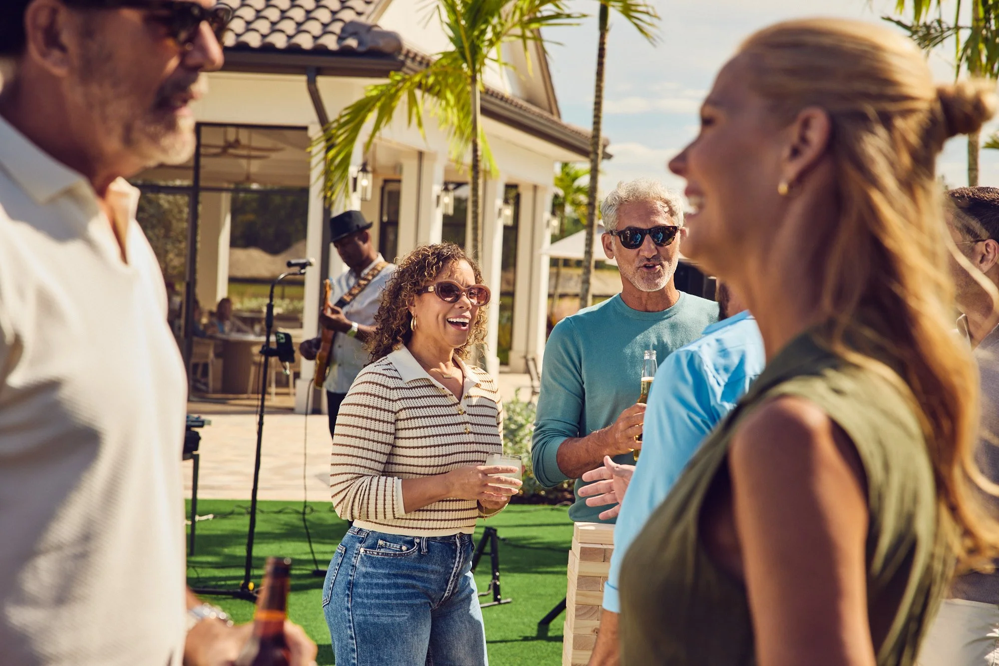 Lifestyle photo - friends enjoying lawn - Explore by Del Webb launch campaign Parrish FL