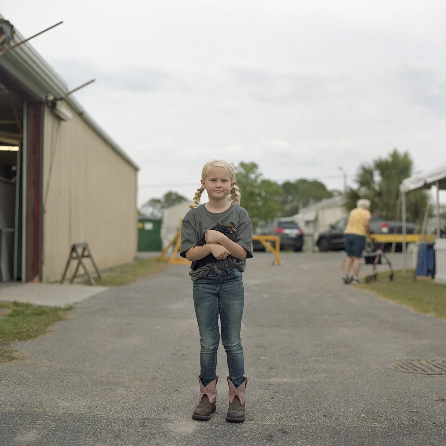 photograph of young girl with bunnuy