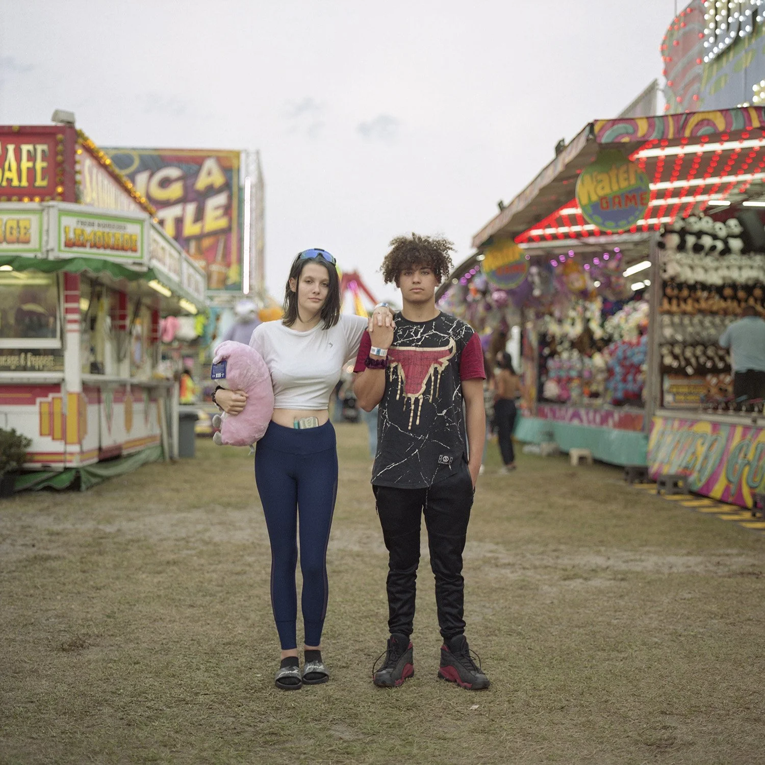 photograph of teenage couple at carnival