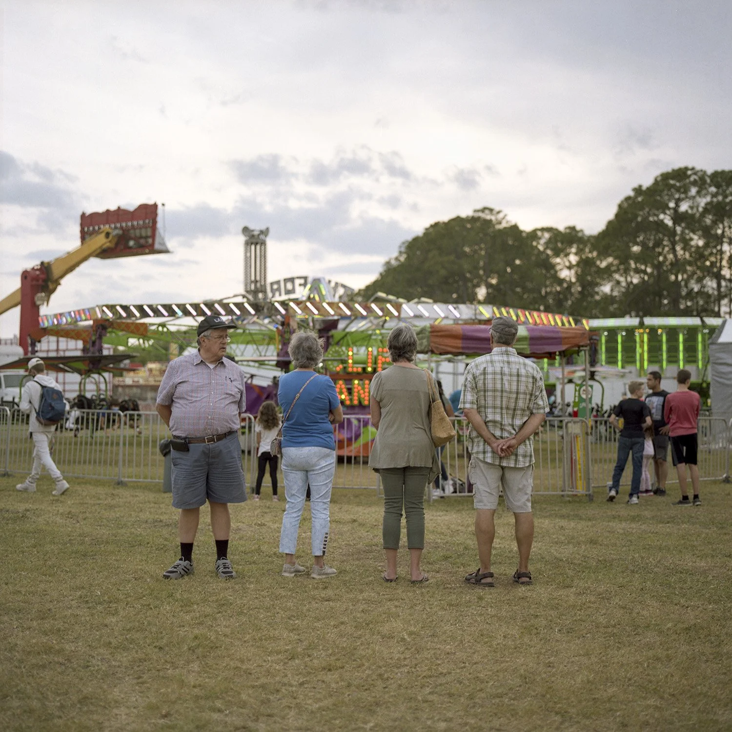 photograph of group of people at carnival