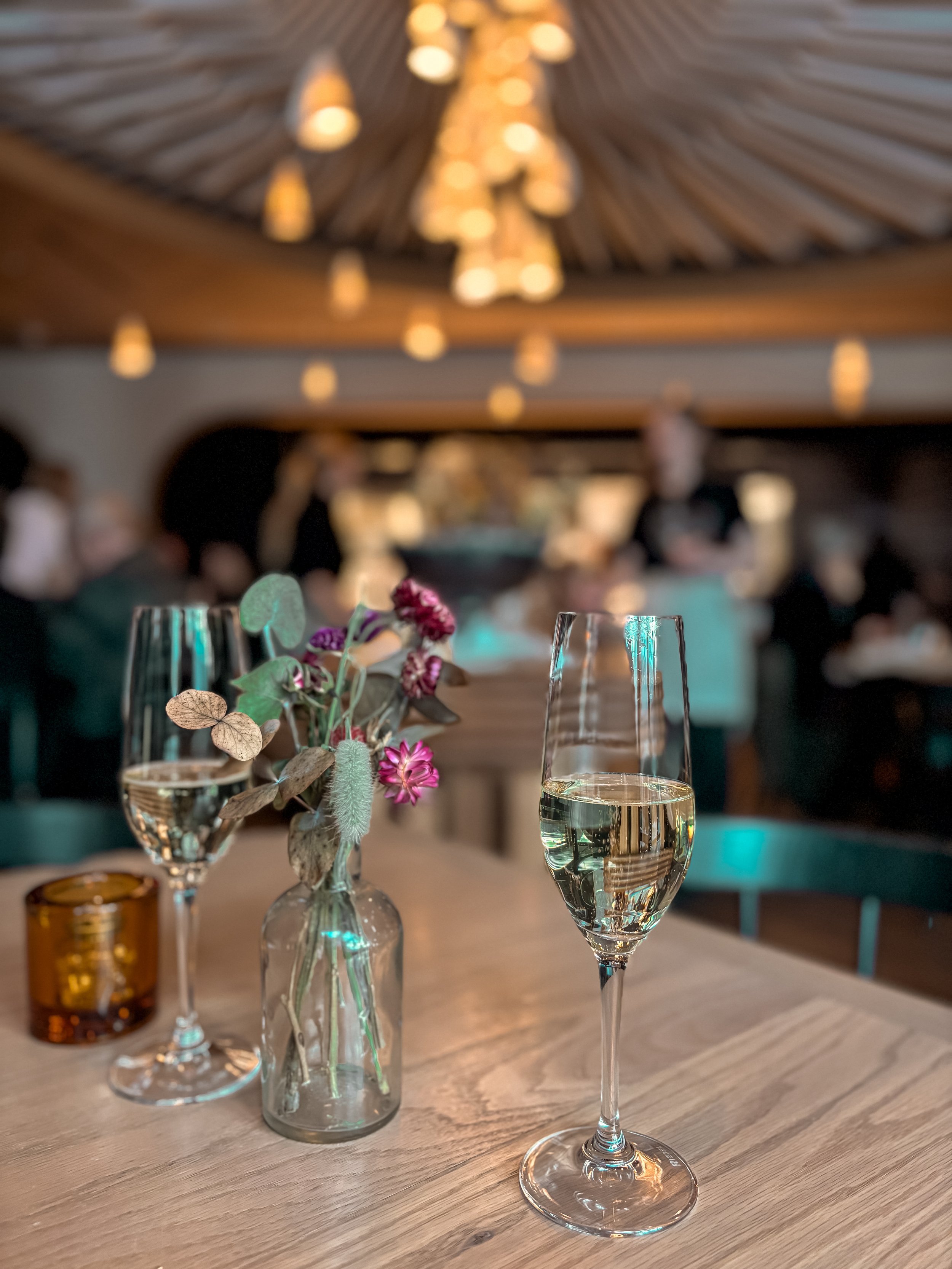 Two wine glasses on the table of The Royal Hotel restaurant