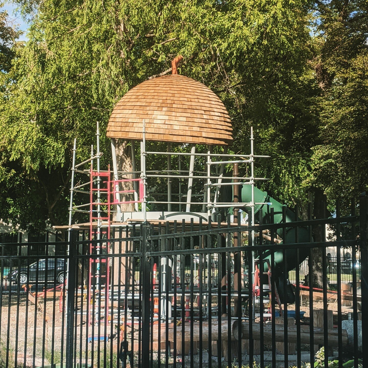 The acorn roof of the tree house is up at The Children's Museum of Southern Oregon!