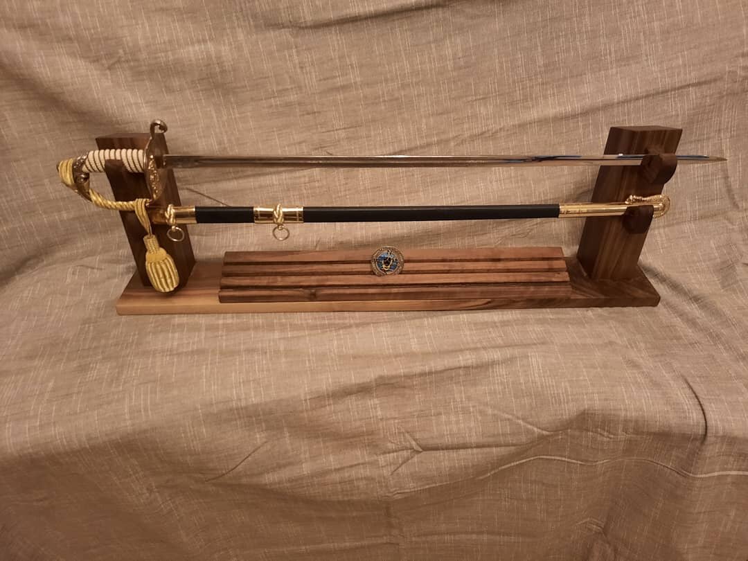 Done with a USCG Officer Sword and Challenge Coin Display! Solid walnut with @howard_products feed&amp;wax finish. For proud display of both your sword and carrer challenge coins.

#USCG #Military #woodworking #handmade #walnut #sword #swords #vetera