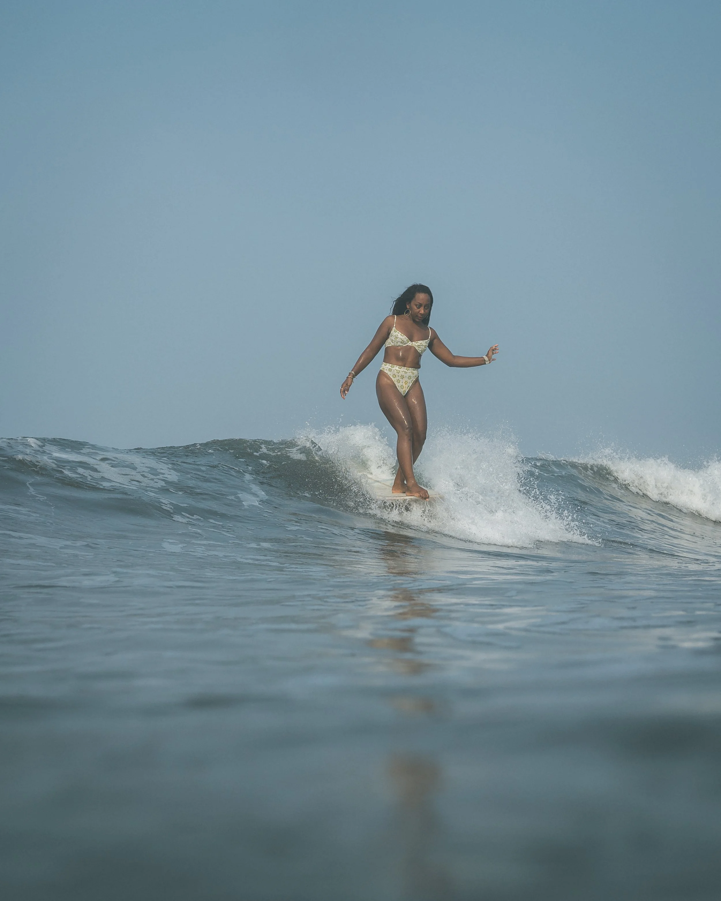 Surfer riding an uncrowded wave on a longboard on Nicaragua's Northern Pacific coast