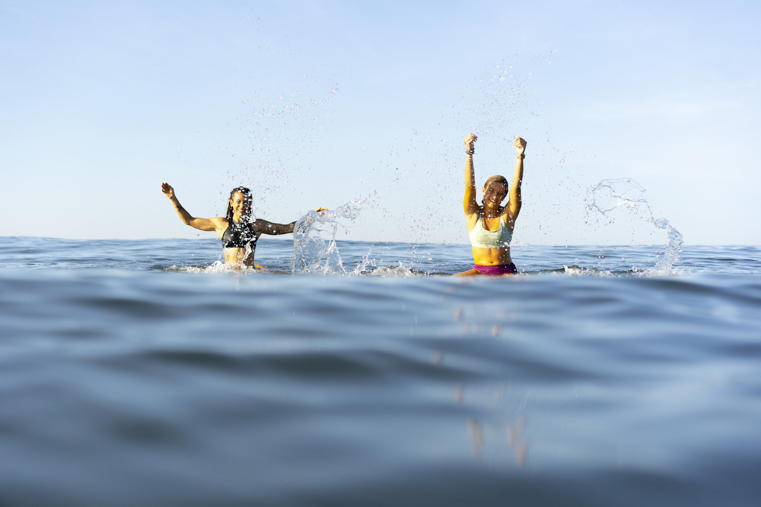 girls surfing nicaragua at surf retreat surf camp style