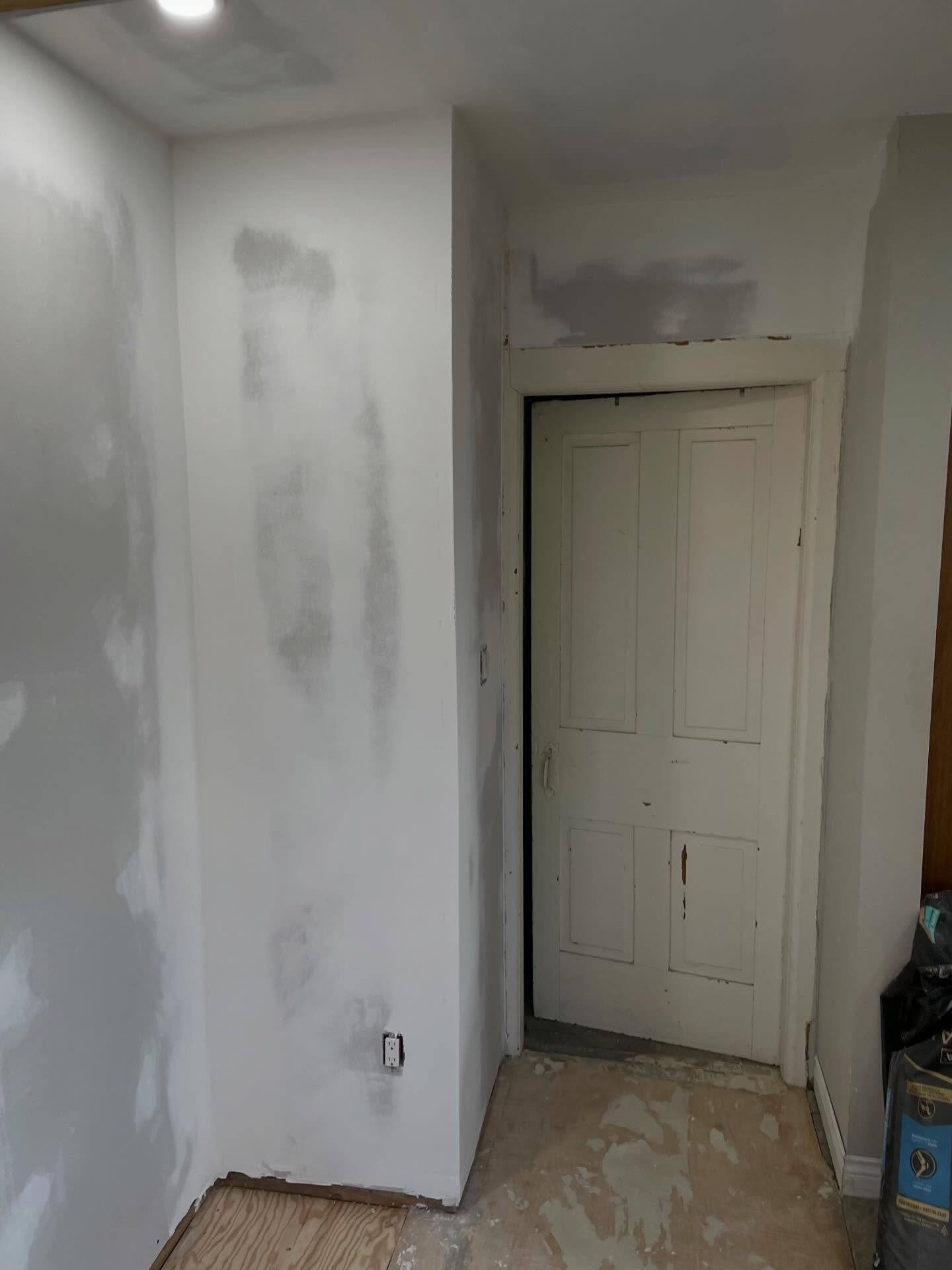 Patched up and ready for primer, paint, and flooring