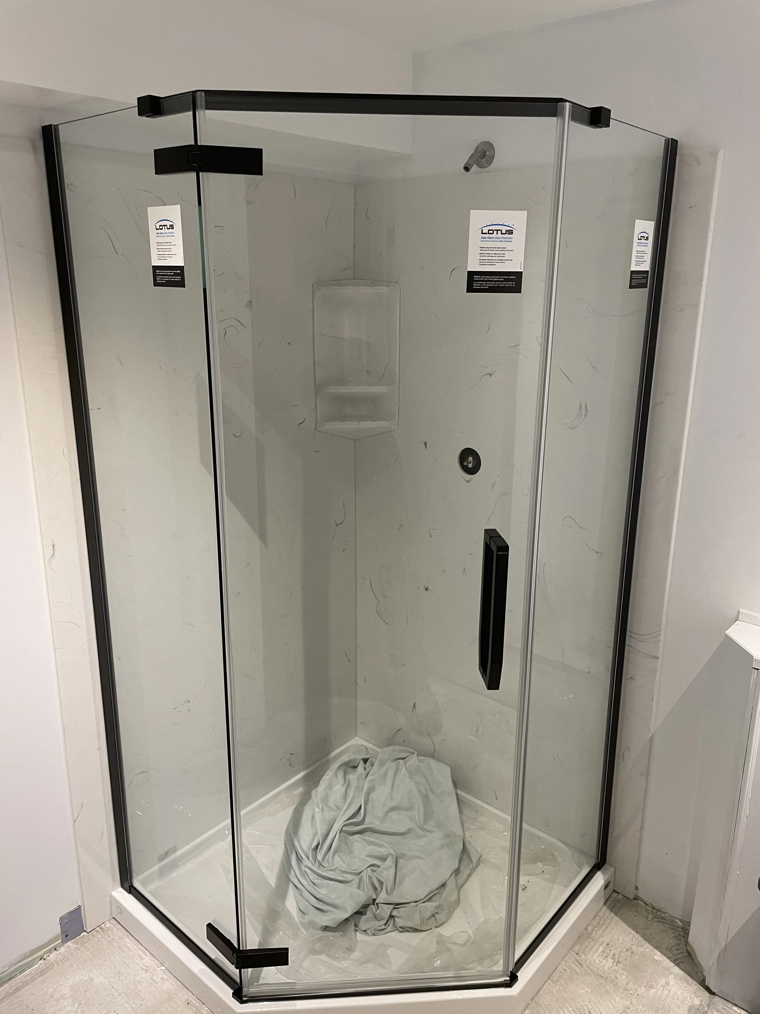 Shower Enclosures and Coni Marble Surrounds