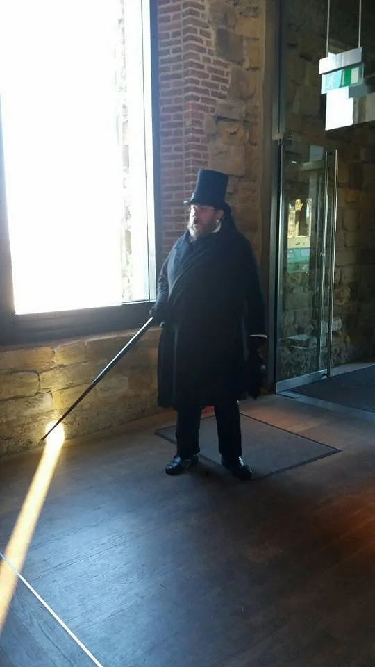 Ghost stories told orally in the ruins of Whitby Abbey by a Victorian funeral director
