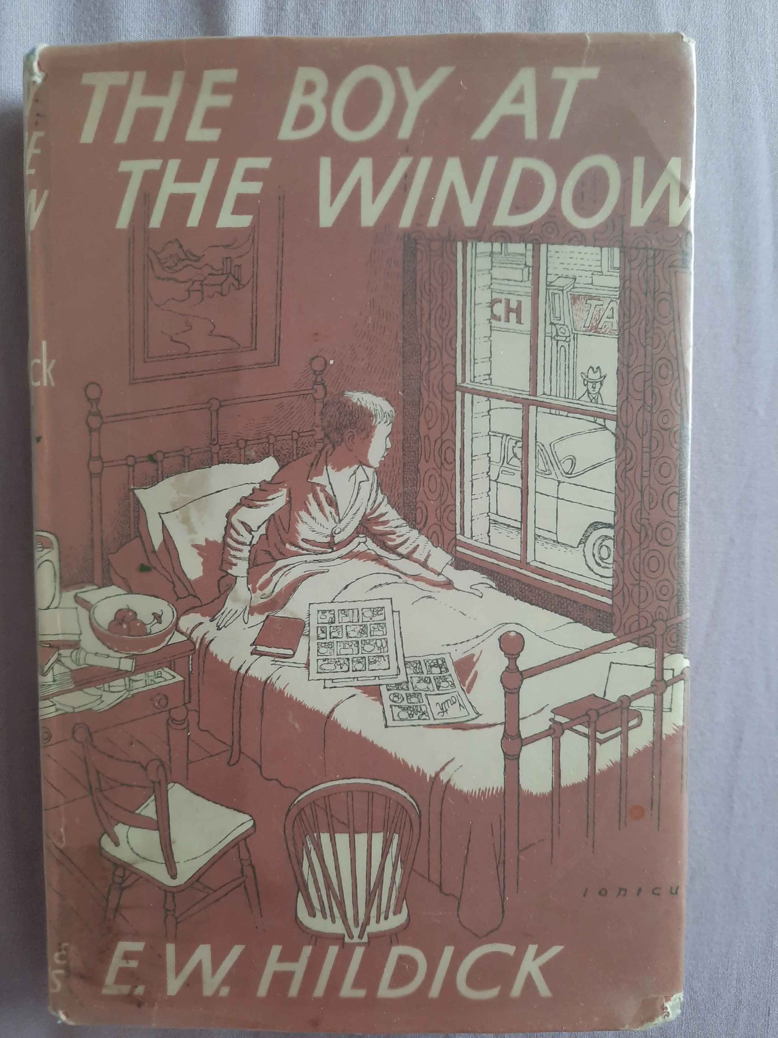 sleeve of the boy at the window