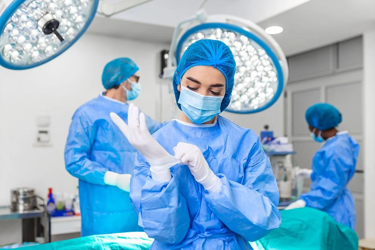 generic operating theatre with nurses preparing