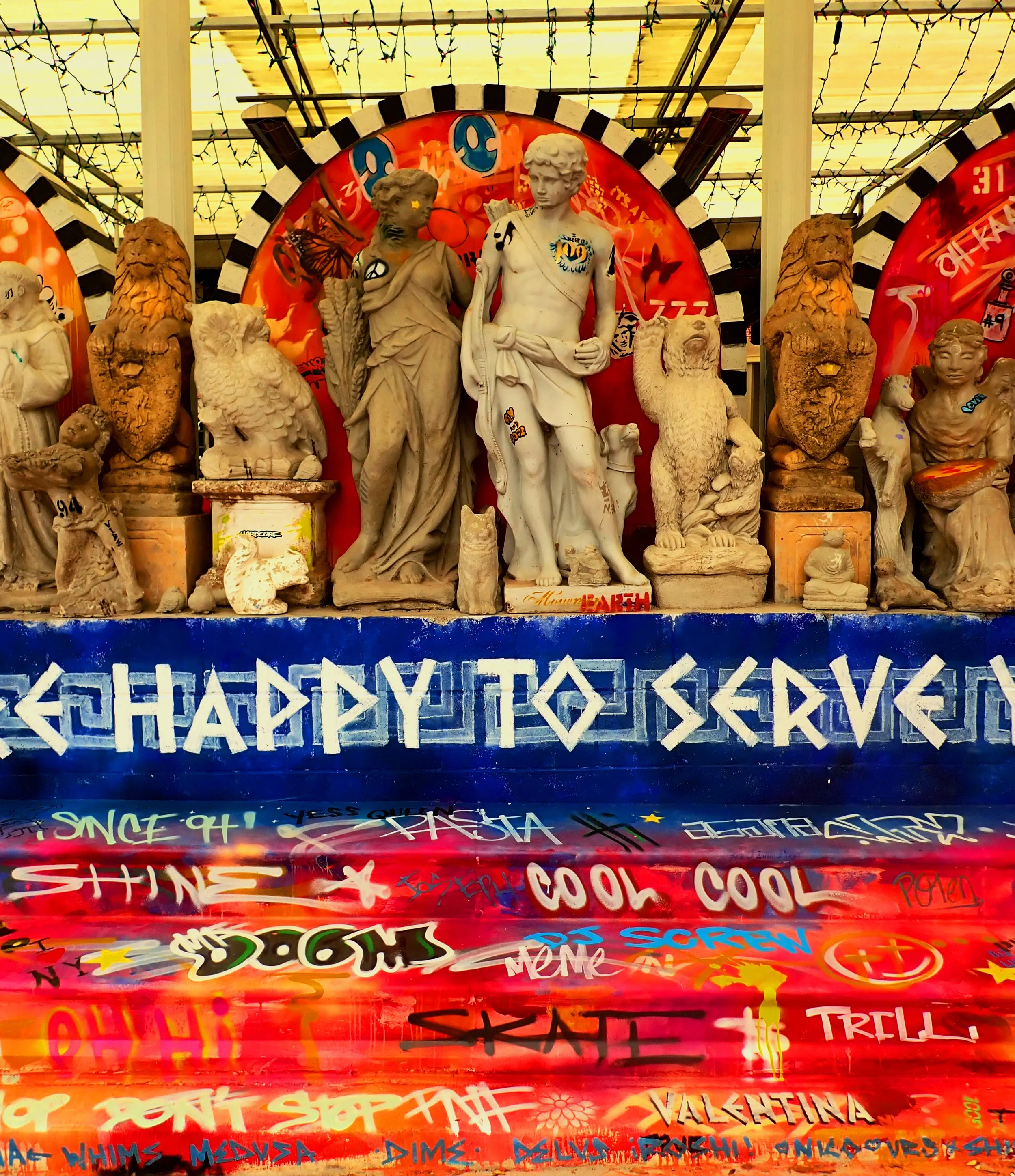 Middle Section of a super fun mural (More like play) painted on statues and steps for Homeslice Pizza in Houston, TX