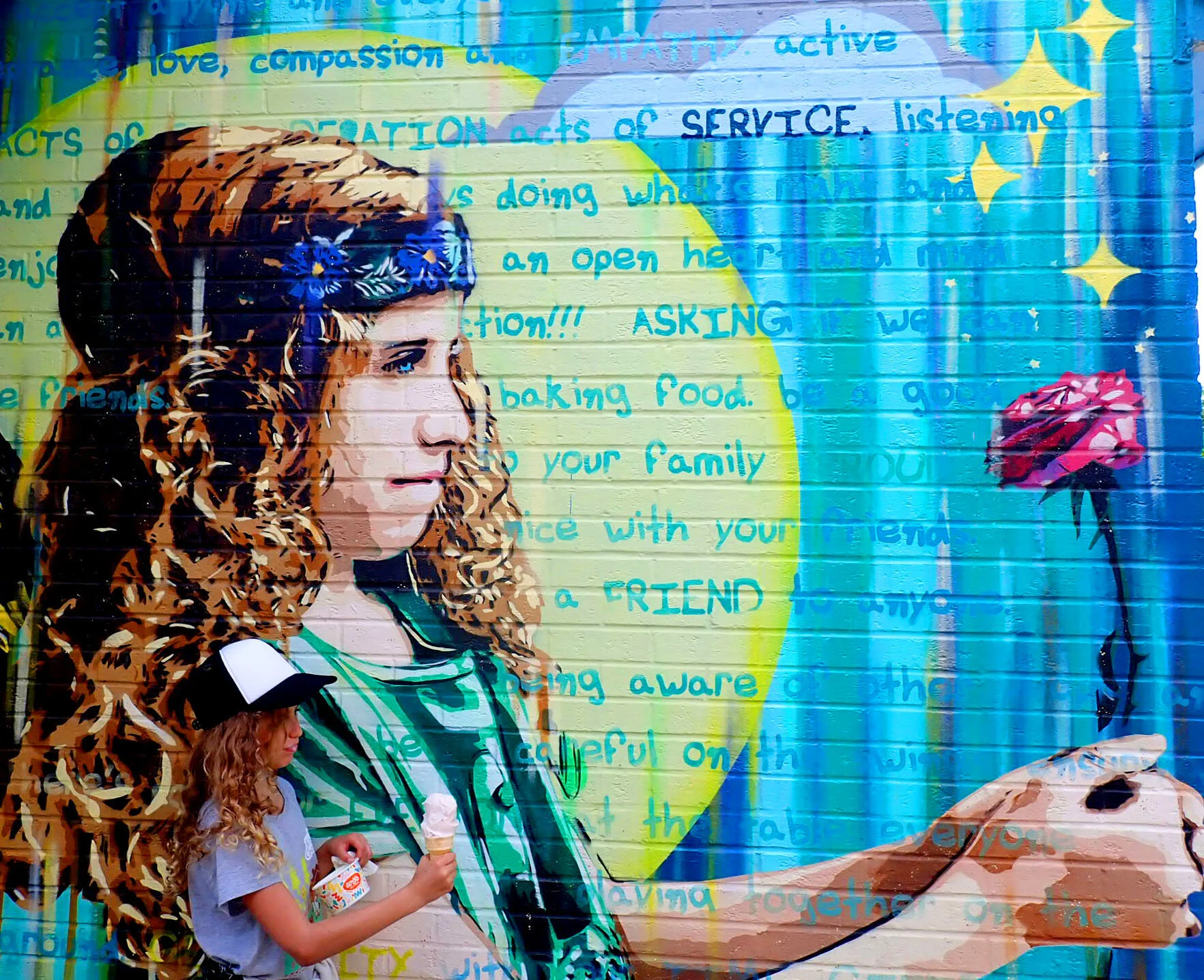 "Be Kind" mural to promote Social and Emotional well being in children pioneered by The Kindness Campaign. Mural was painted on Amy's Ice Cream in Austin, TX